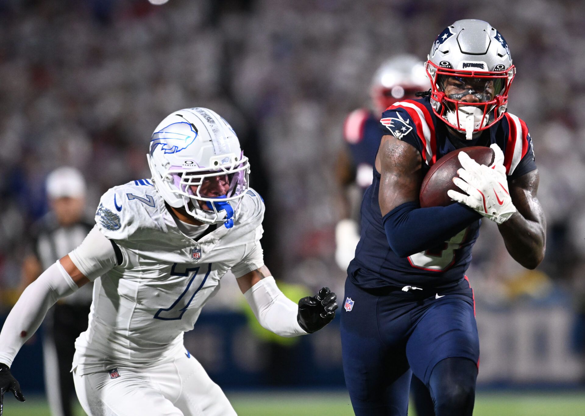 New England Patriots wide receiver Stefon Diggs (8) makes a catch against the Buffalo Bills during the second half at Highmark Stadium.