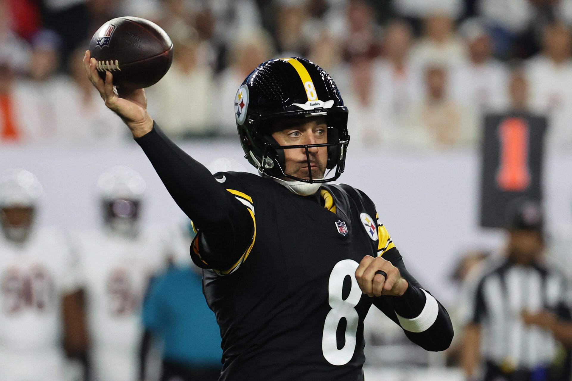 Pittsburgh Steelers quarterback Aaron Rodgers (8) throws a pass against the Cincinnati Bengals during the first quarter at Paycor Stadium.