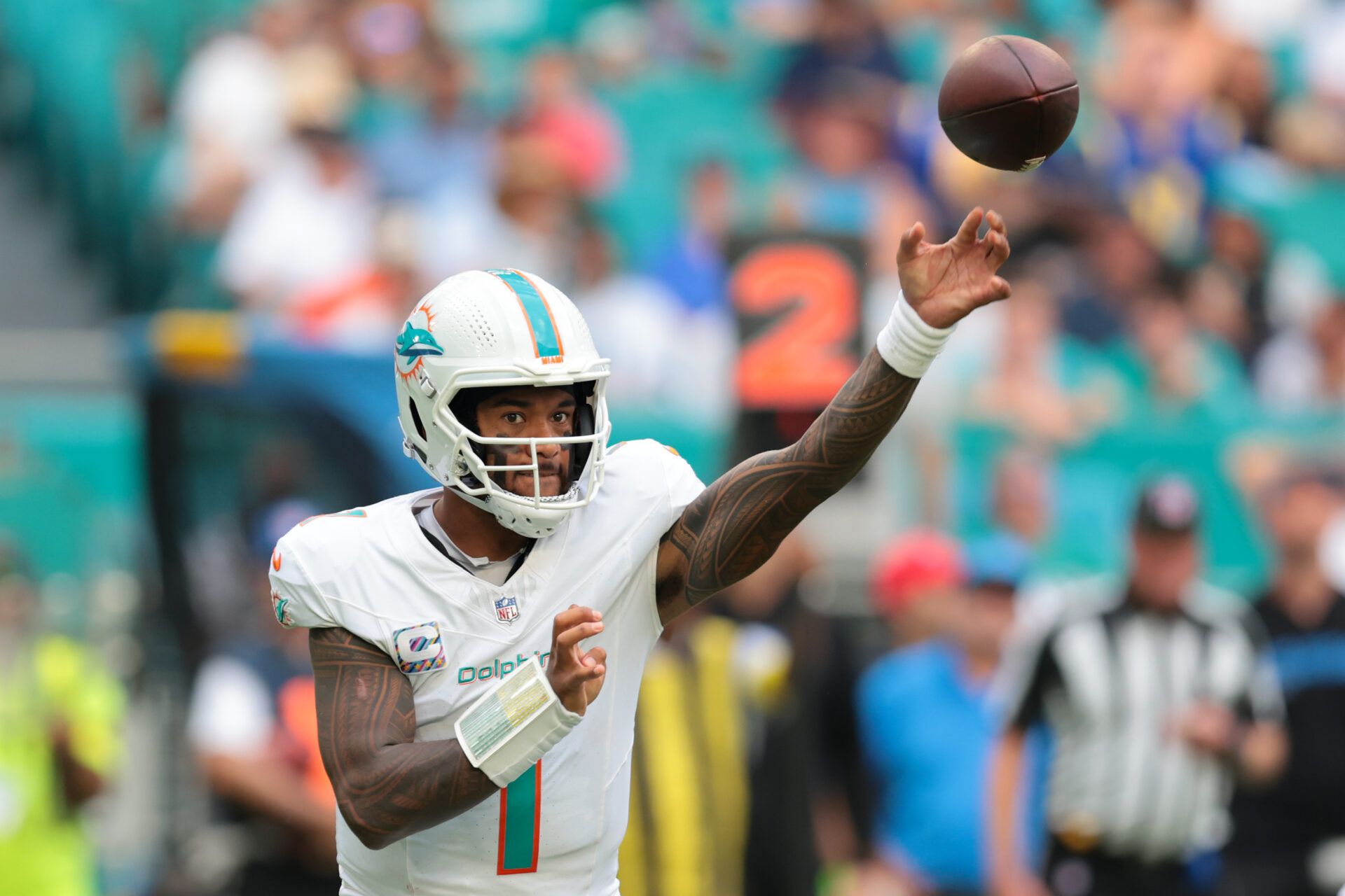 Miami Dolphins quarterback Tua Tagovailoa (1) passes the football against the Los Angeles Chargers during the third quarter at Hard Rock Stadium.
