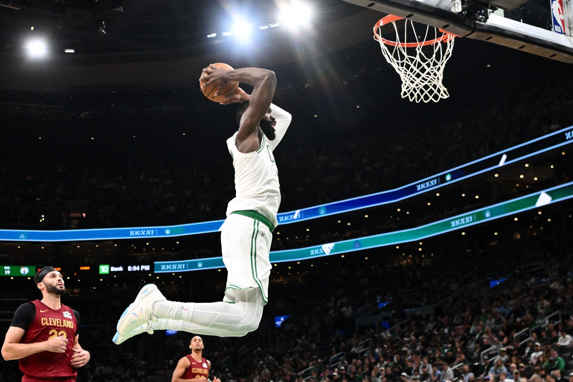 Boston Celtics guard/forward Jaylen Brown (7) dunks and scores against the Cleveland Cavaliers during the first half at TD Garden.