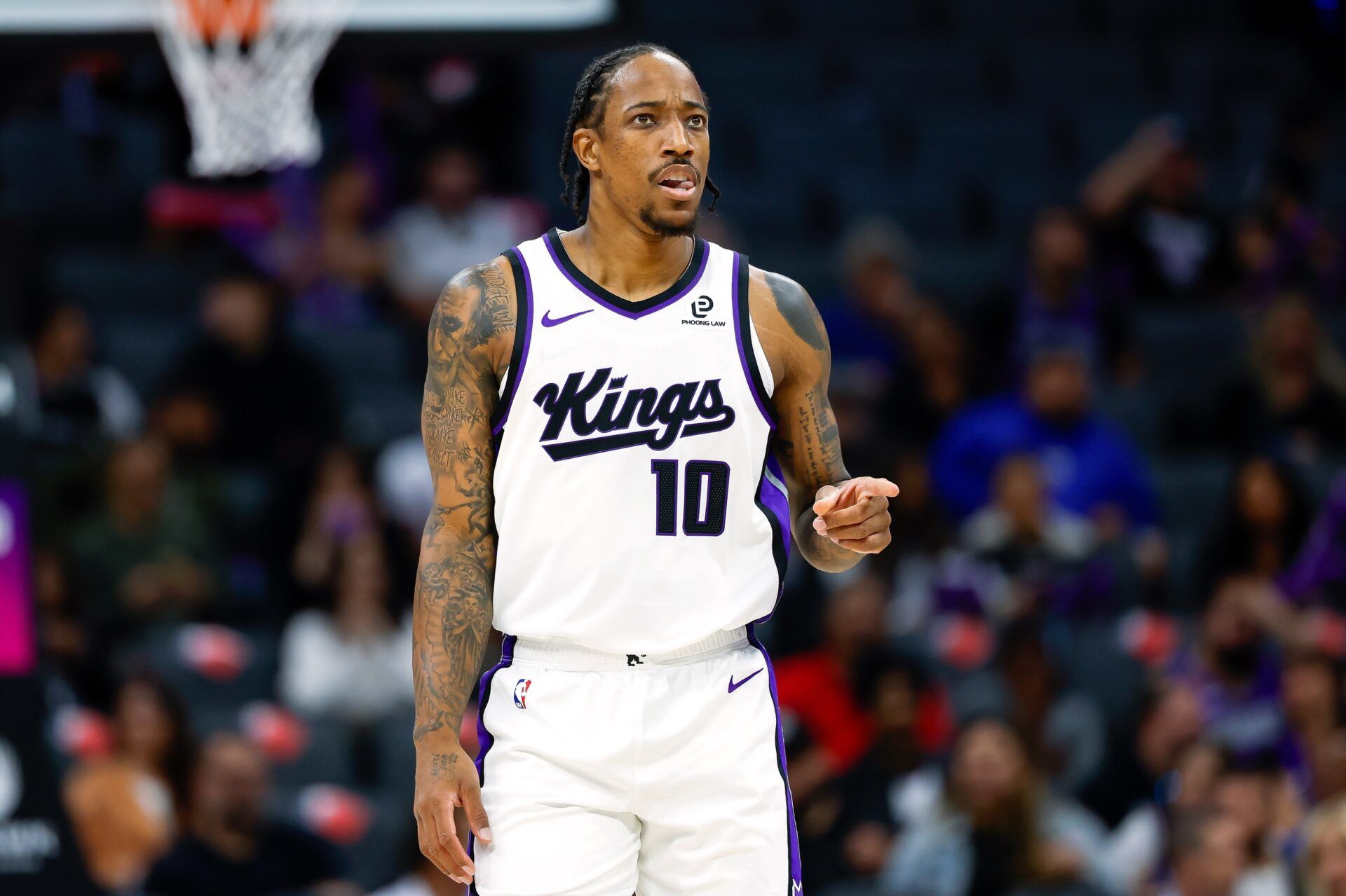 Sacramento Kings guard/forward Demar Derozan (10) reacts during the first quarter against the Toronto Raptors at Golden 1 Center.
