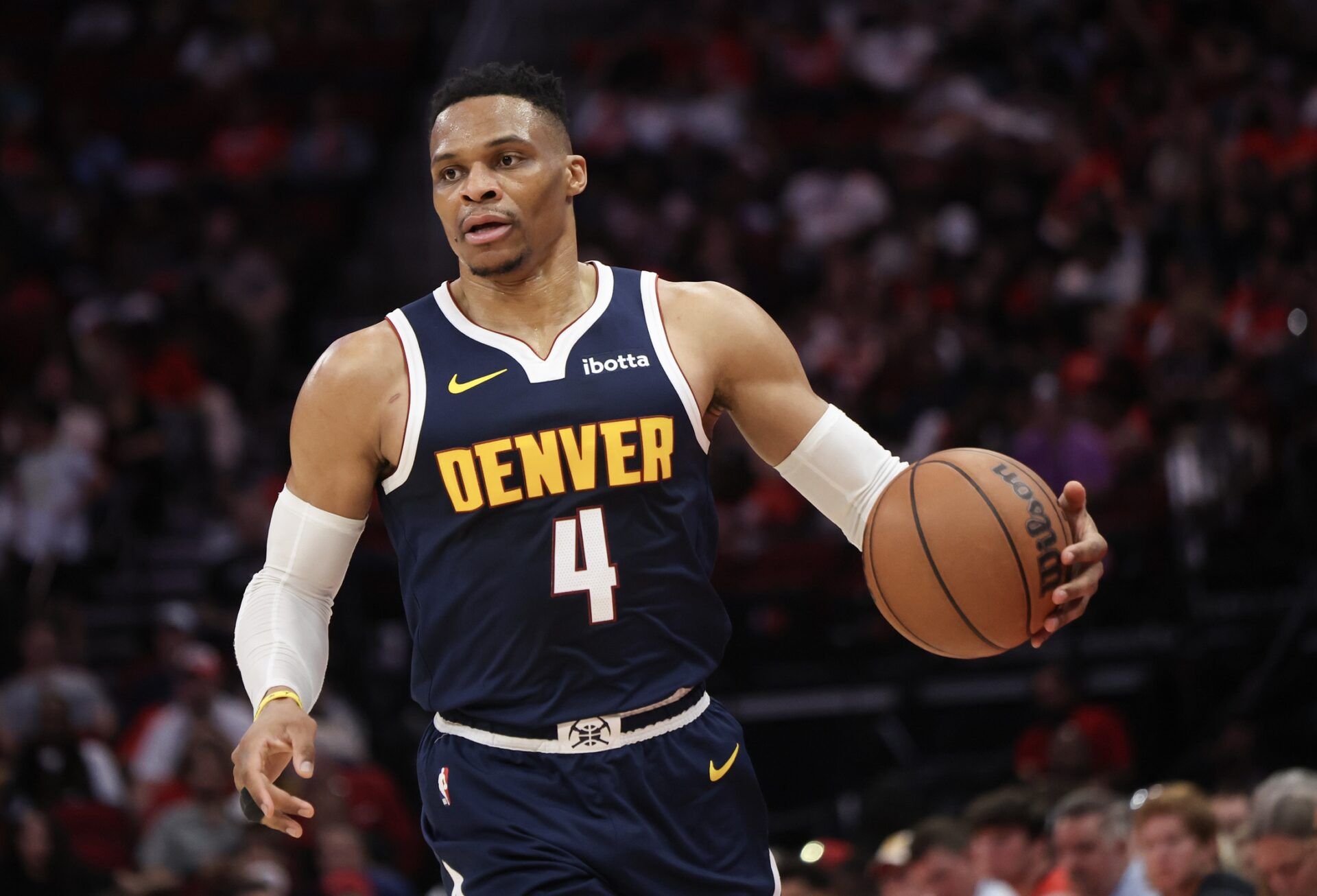 Denver Nuggets guard Russell Westbrook (4) dribbles against the Houston Rockets in the second half at Toyota Center.