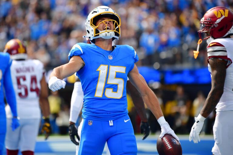 Los Angeles Chargers wide receiver Ladd McConkey (15) celebrates after scoring a touchdown against the Washington Commanders in the first quarter at SoFi Stadium.