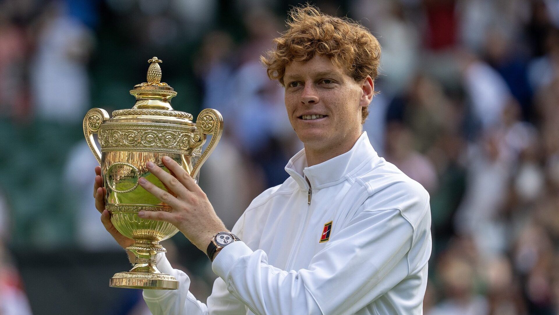 Wimbledon, United Kingdom; Jannik Sinner of Italy poses with the trophy after winning the menÕs singles final match against Carlos Alcaraz of Spain on day 14 at All England Lawn Tennis and Croquet Club.