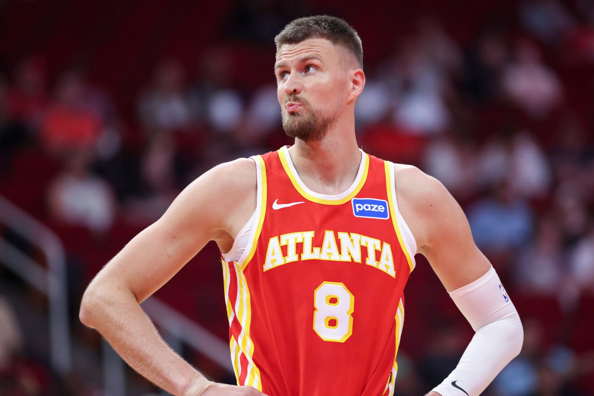 Atlanta Hawks forward/center Kristaps Porzingis (8) reacts during the second quarter against the Houston Rockets at Toyota Center.