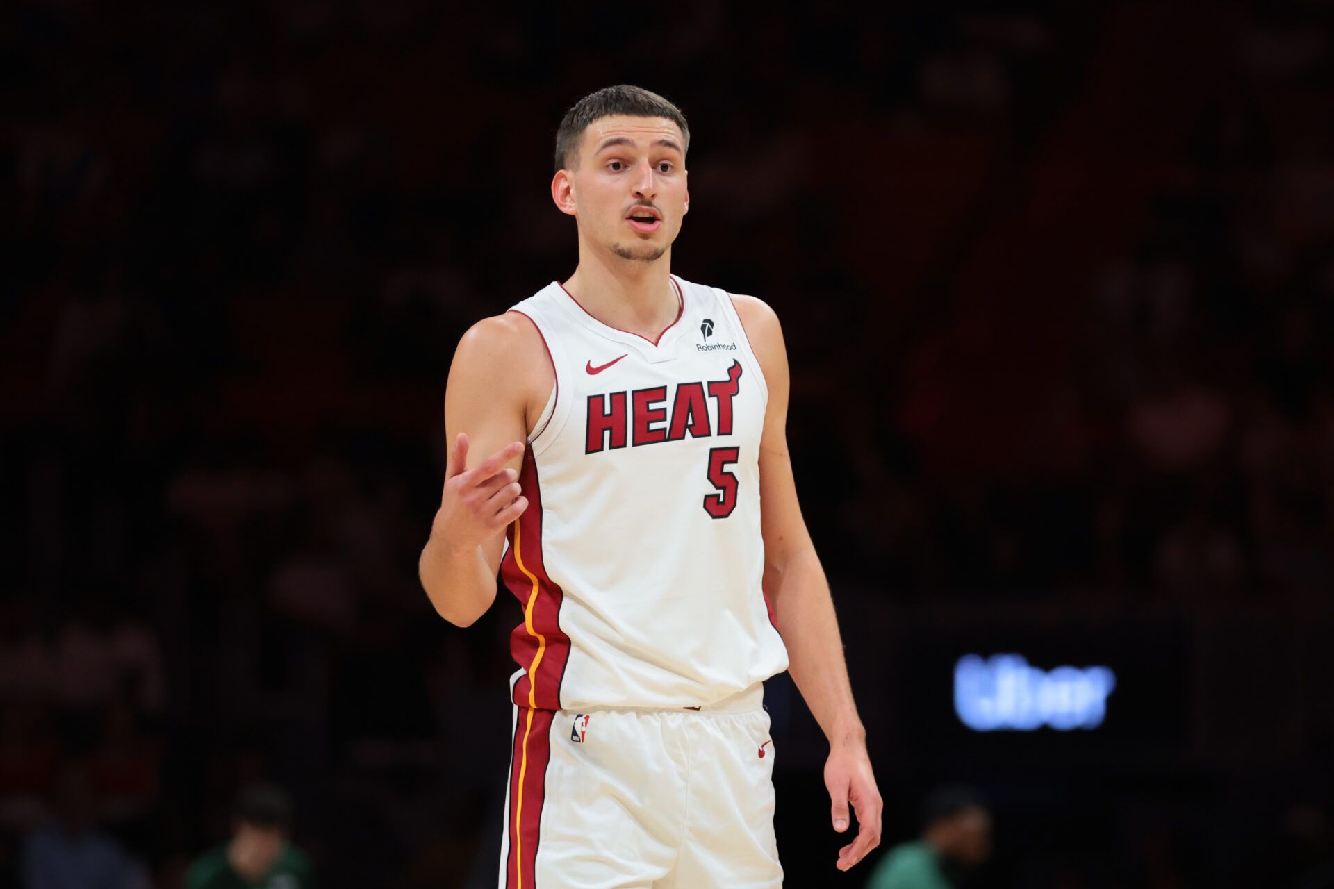 Miami Heat forward Nikola Jovic (5) talks to his teammates against the Milwaukee Bucks during the second quarter at Kaseya Center.