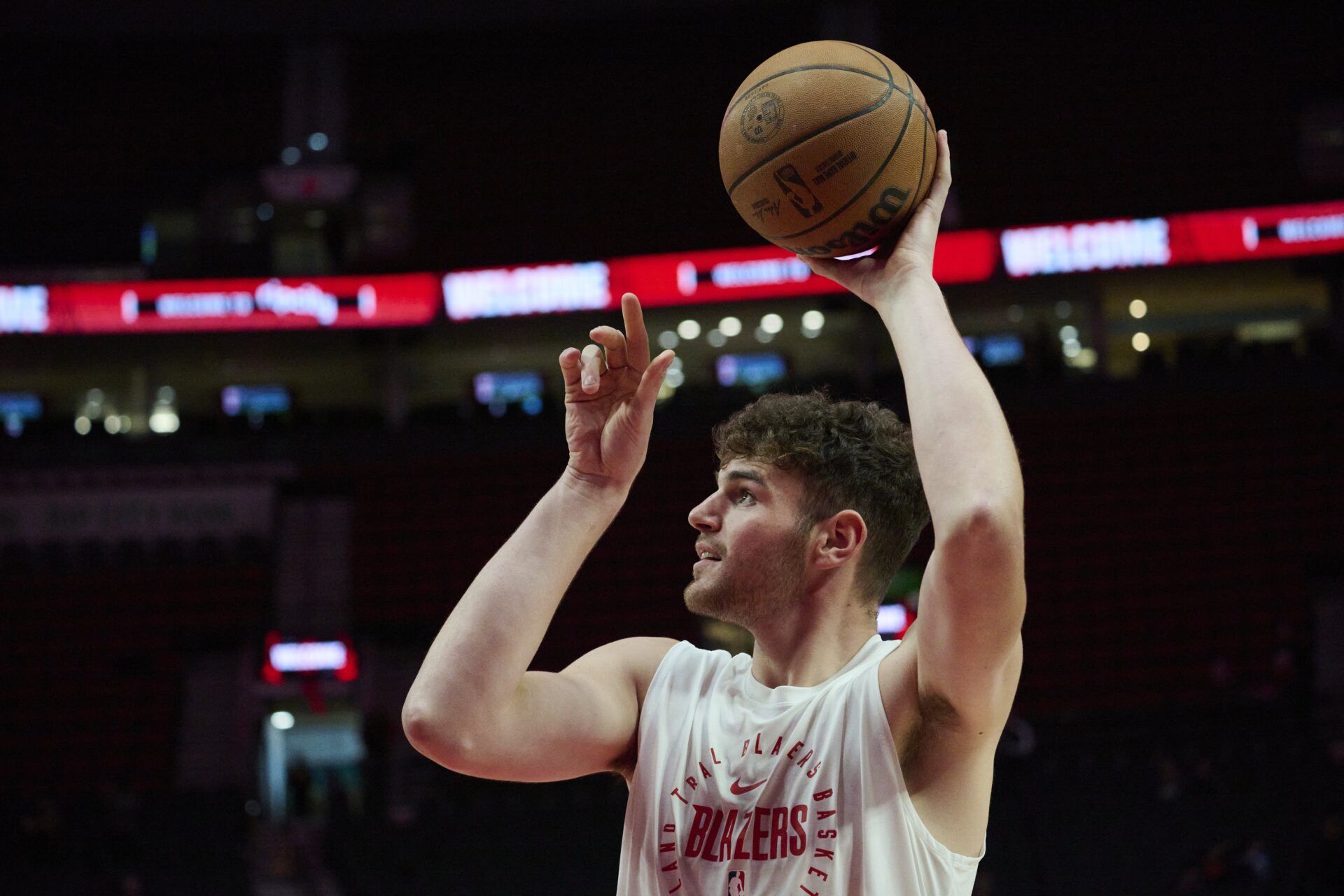 Portland Trail Blazers center Donovan Clingan (23) warms up before a preseason game against the Golden State Warriors at Moda Center.