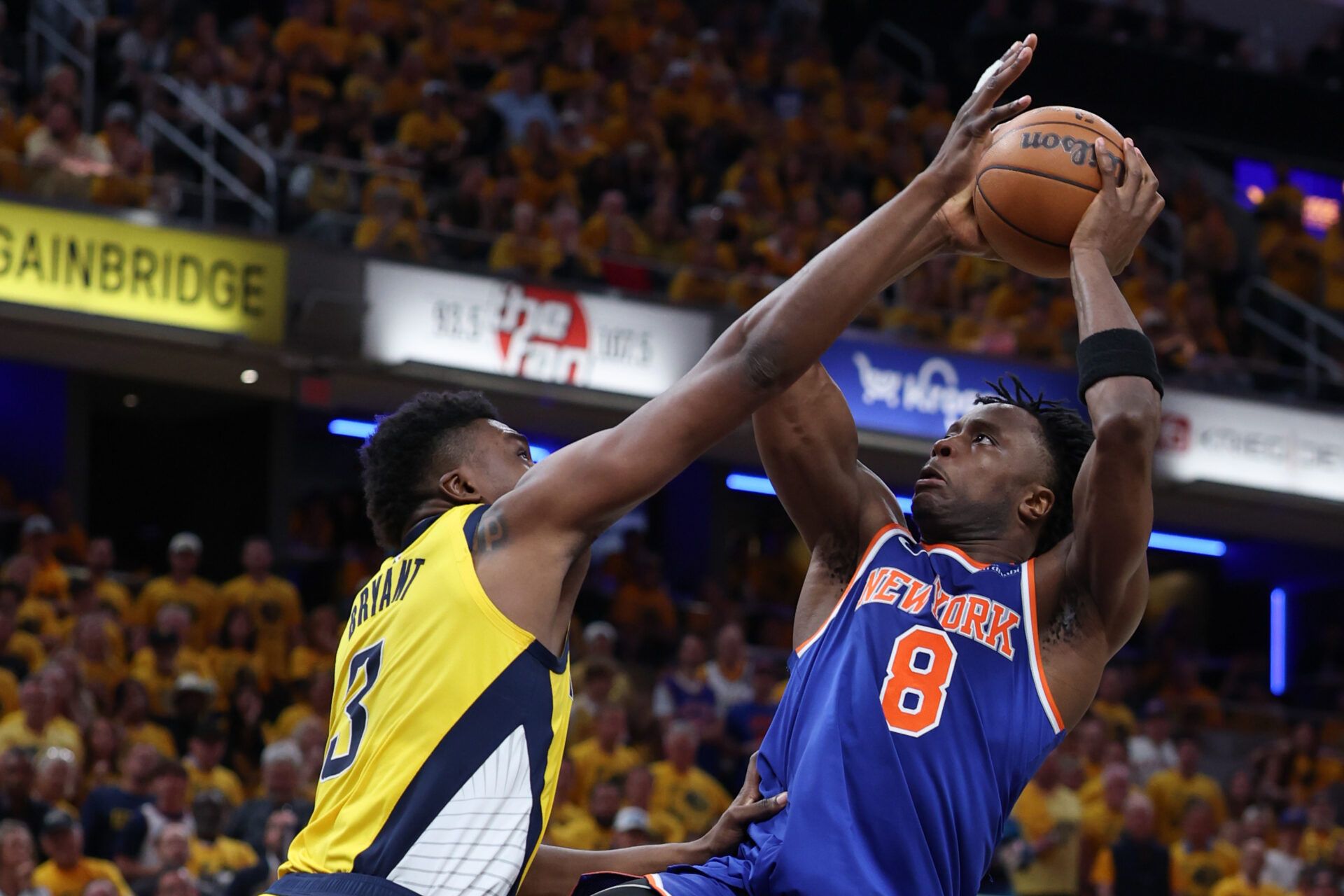 New York Knicks forward OG Anunoby (8) shoots the ball against Indiana Pacers center Thomas Bryant (3) in the third quarter during game six of the eastern conference finals for the 2025 NBA Playoffs at Gainbridge Fieldhouse.