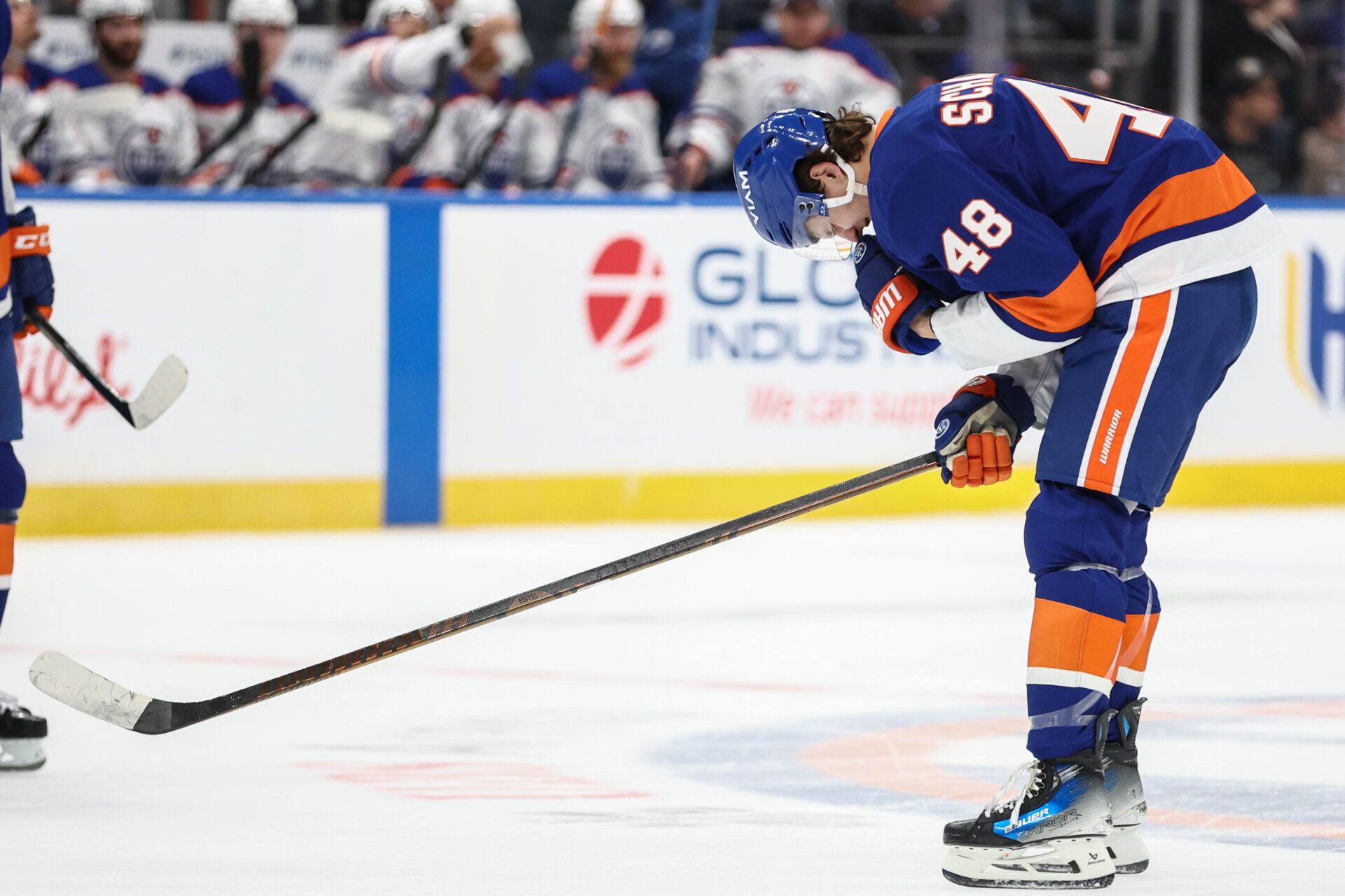 New York Islanders defenseman Matthew Schaefer (48) skates to the bench after getting hit in the face in the third period against the Edmonton Oilers at UBS Arena.