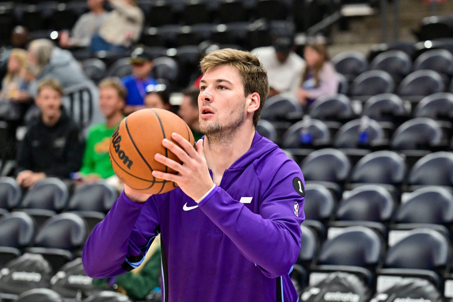 Utah Jazz center Kyle Filipowski (22) warms up before the game against the Portland Trail Blazers at Delta Center.