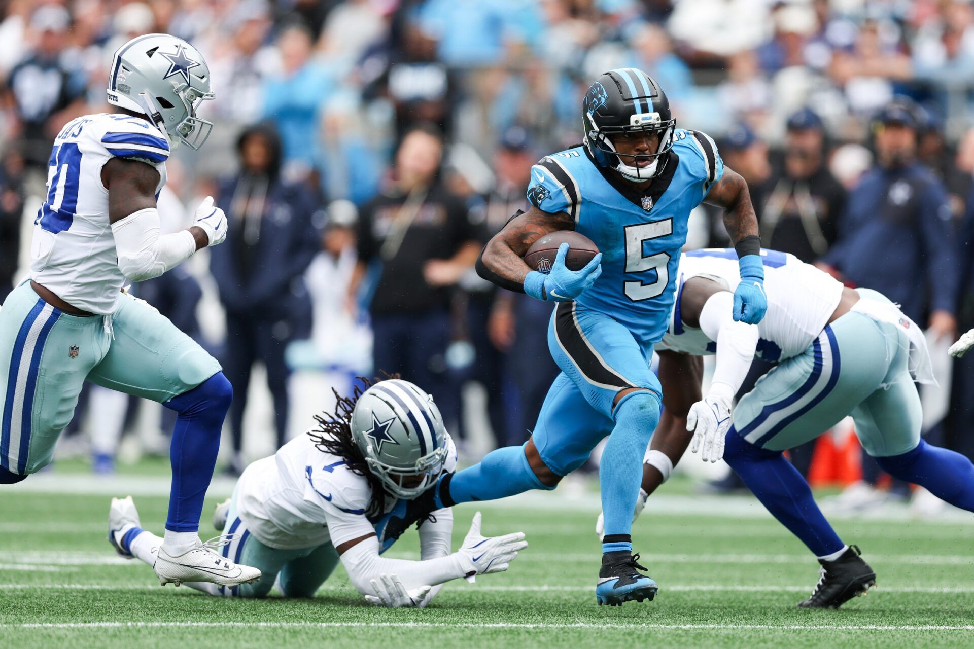 Carolina Panthers running back Rico Dowdle (5) runs with the ball during the second half against the Dallas Cowboys at Bank of America Stadium.