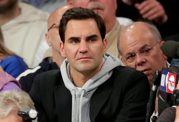 Swiss tennis star Roger Federer (right) and his wife Mirka sit court side during the fourth quarter of game two of the 2023 NBA Eastern Conference semifinal playoffs between the New York Knicks and the Miami Heat at Madison Square Garden.