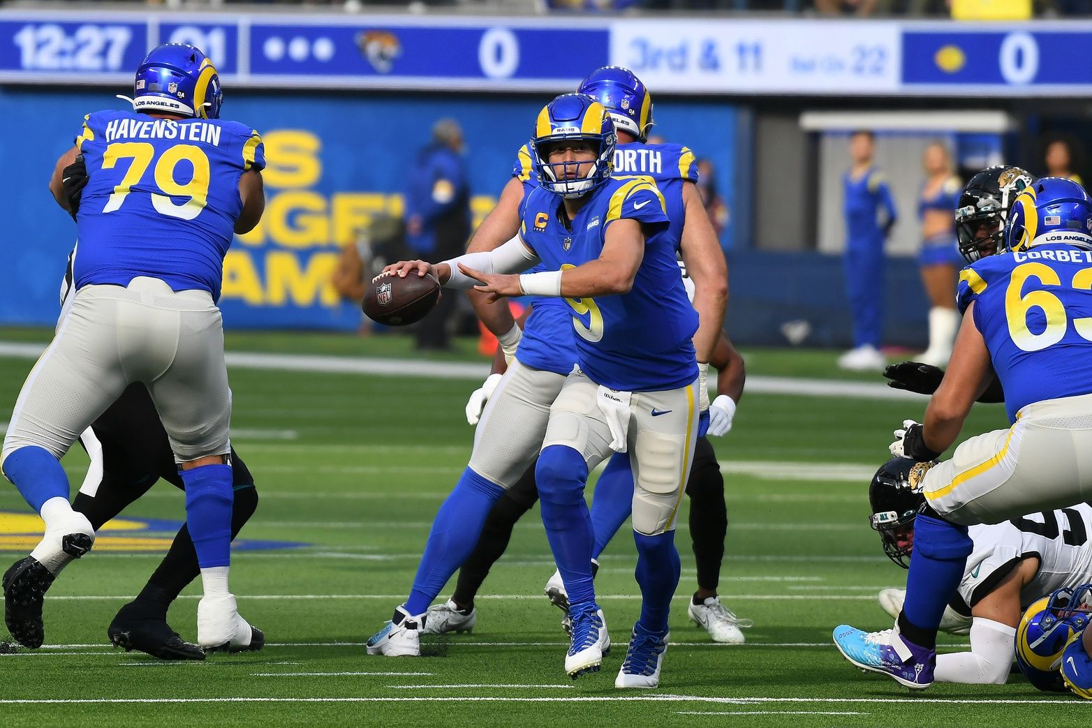 Los Angeles Rams quarterback Matthew Stafford (9) makes a pass against the Jacksonville Jaguars in the first quarter at SoFi Stadium.
