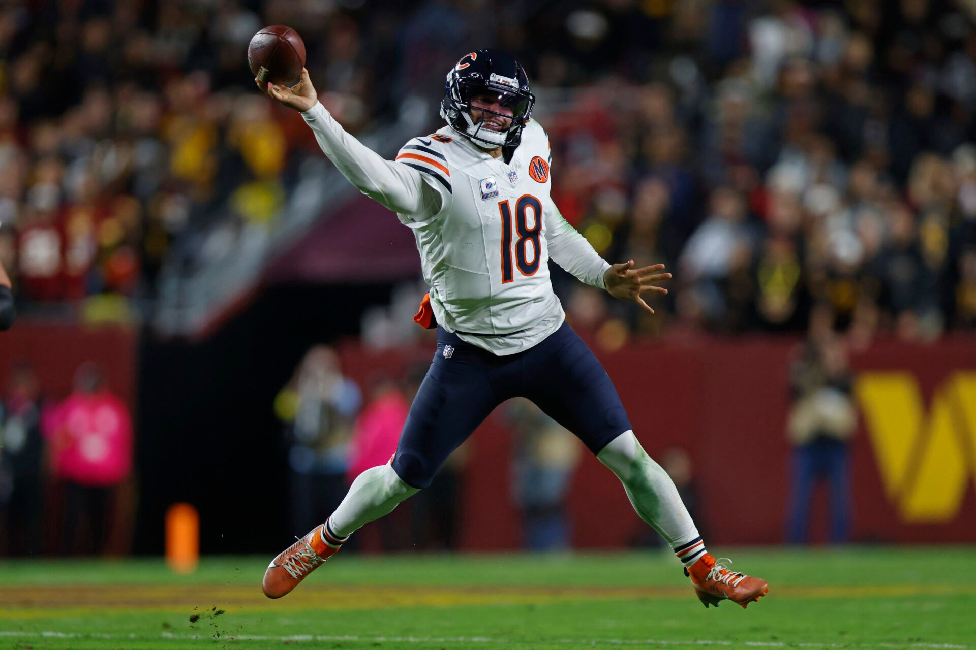 Chicago Bears quarterback Caleb Williams (18) throws the ball against the Washington Commanders during the third quarter at Northwest Stadium.