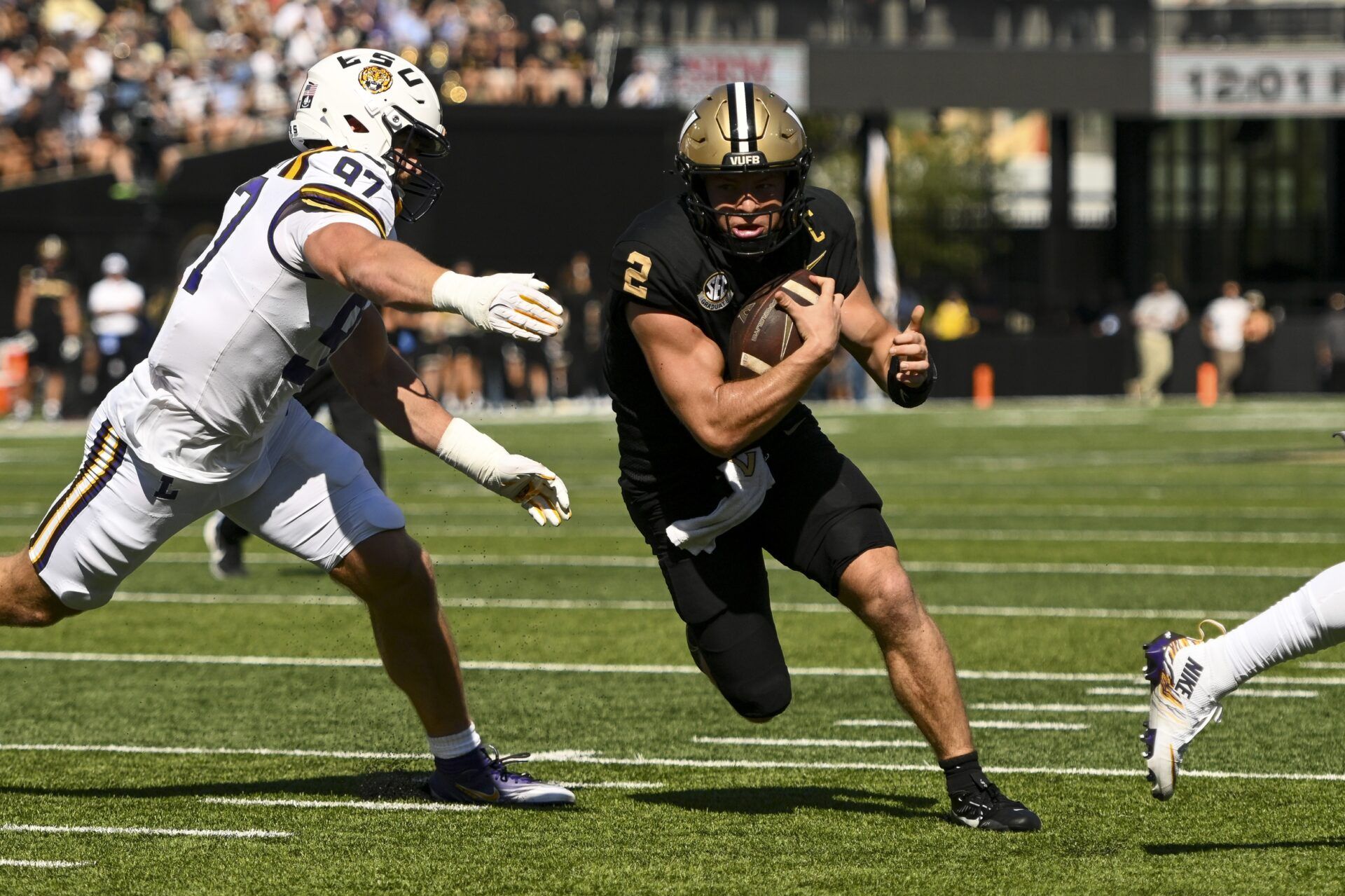 Vanderbilt Commodores quarterback Diego Pavia (2) runs with the ball against the Louisiana State Tigers during the first half at FirstBank Stadium.
