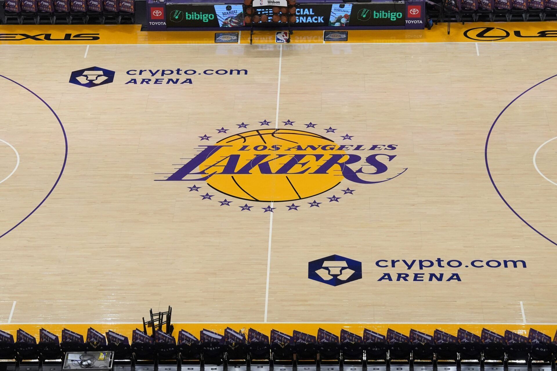 The Los Angeles Lakers logo at center court at the Crypto.com Arena.