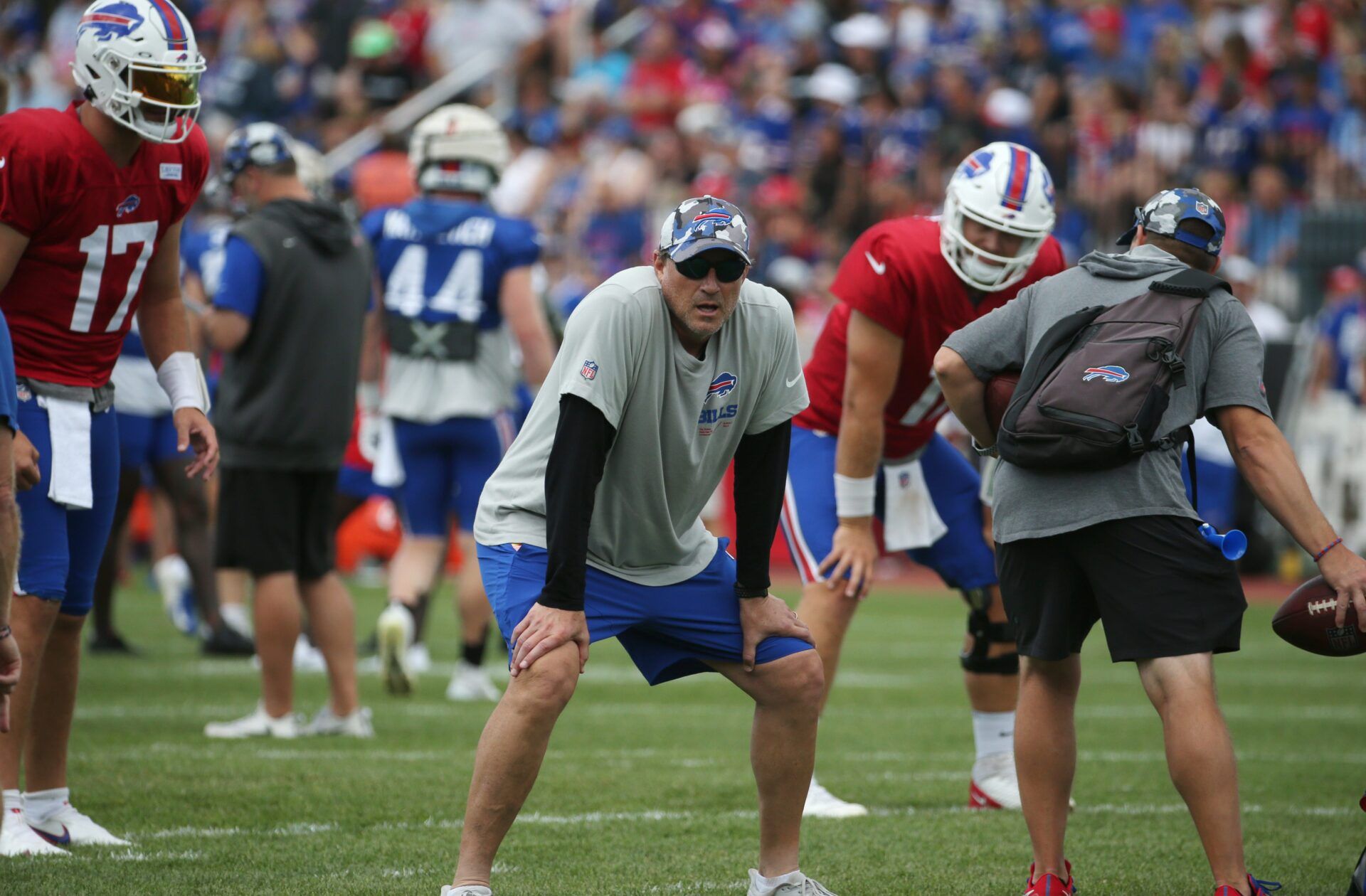 Bills senior offensive assistant Mike Shula, center, lines up as a tight end as he joins in a play during day six of the Buffalo Bills training camp at St John Fisher University in Rochester Saturday, July 30, 2022.

Sd 073022 Bills Camp 25 Spts