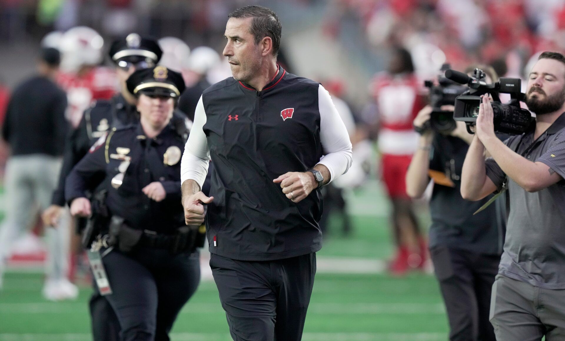 Wisconsin head coach Luke Fickell runs off the field after their 34-0 loss to Ohio State Saturday, October 18, 2025 at Camp Randall Stadium in Madison, Wisconsin.