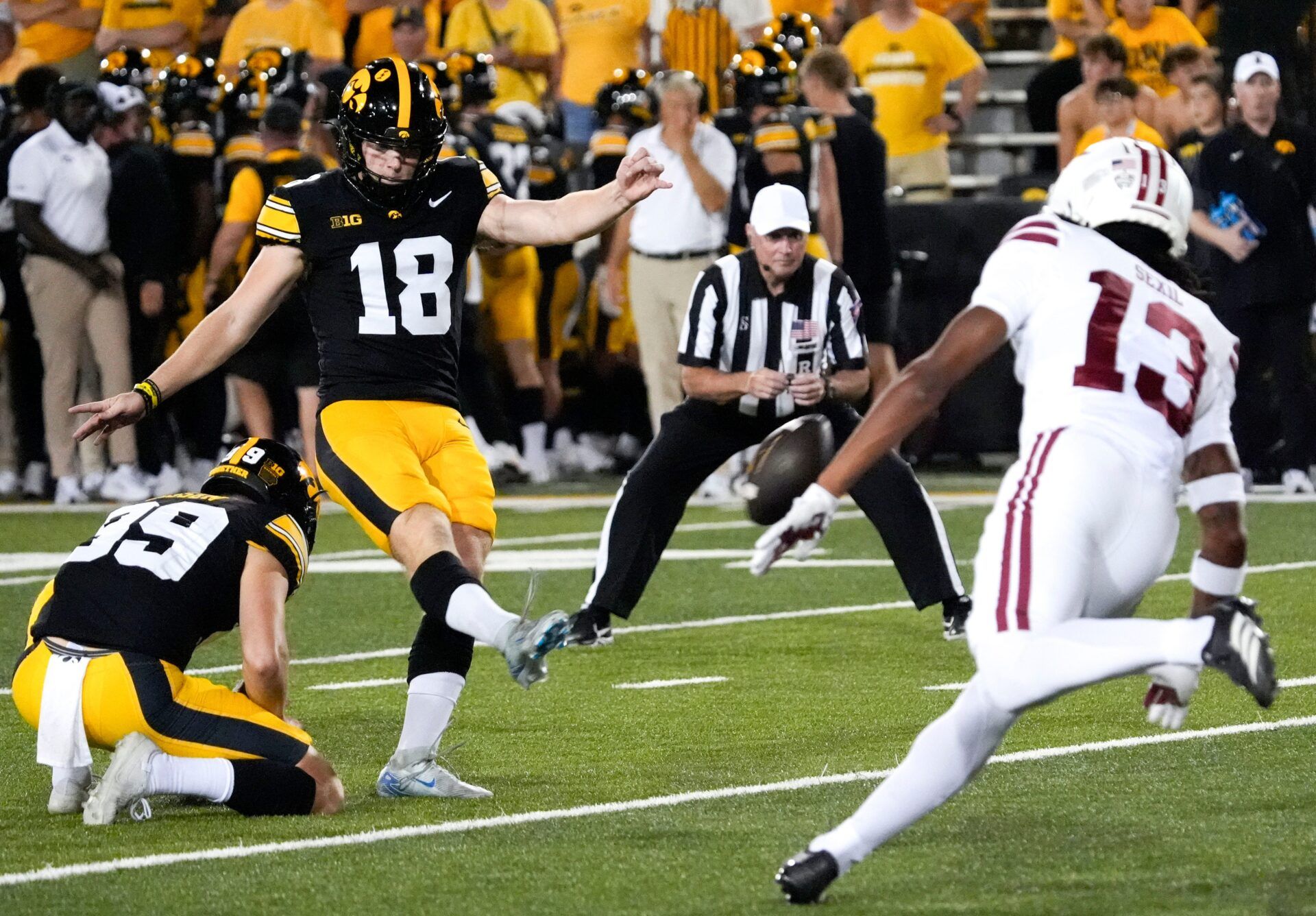 Iowa Hawkeyes place kicker Drew Stevens (18) kicks an extra point agains the Massachusetts Minutemen Sept. 13, 2025 at Kinnick Stadium in Iowa City, Iowa.
