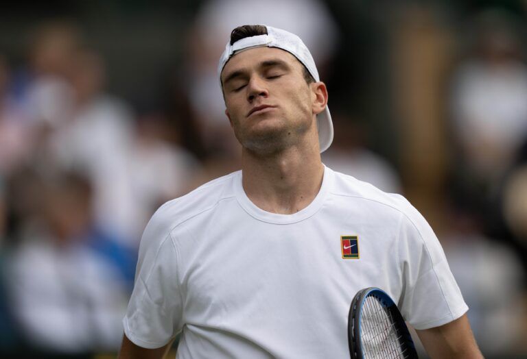 Jack Draper of Great Britain reacts to a point during his match against Marin Cilic of Croatia on day four at the All England Lawn Tennis and Croquet Club.