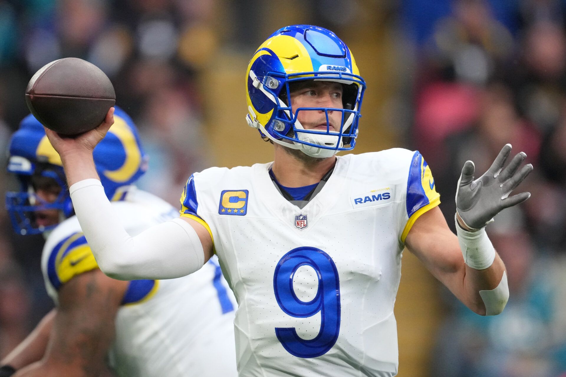 Los Angeles Rams quarterback Matthew Stafford (9) passes the ball against the Jacksonville Jaguars during the first half of an NFL International Series game at Wembley Stadium.