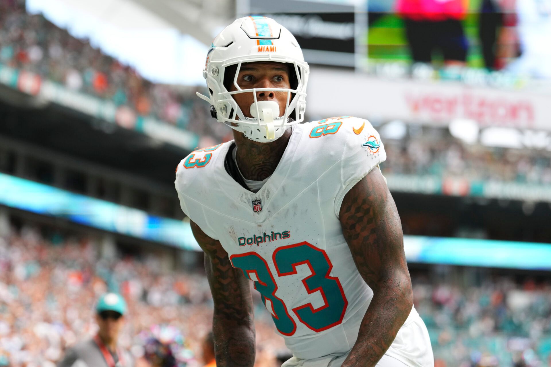Miami Dolphins tight end Darren Waller (83) celebrates after scoring a touchdown against the Los Angeles Chargers during the fourth quarter at Hard Rock Stadium.