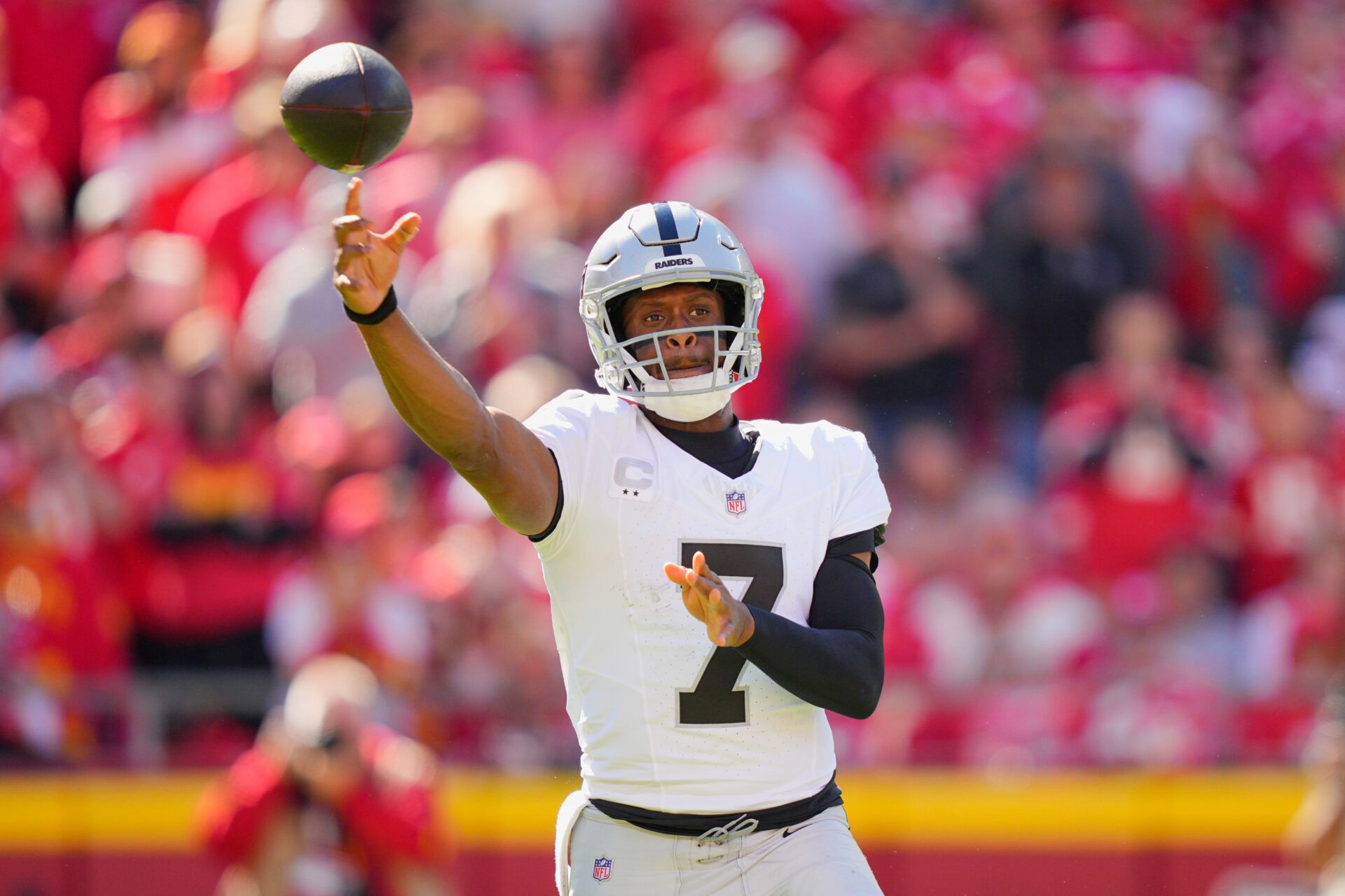Las Vegas Raiders quarterback Geno Smith (7) passes the ball against the Kansas City Chiefs during the third quarter of the game at GEHA Field at Arrowhead Stadium.