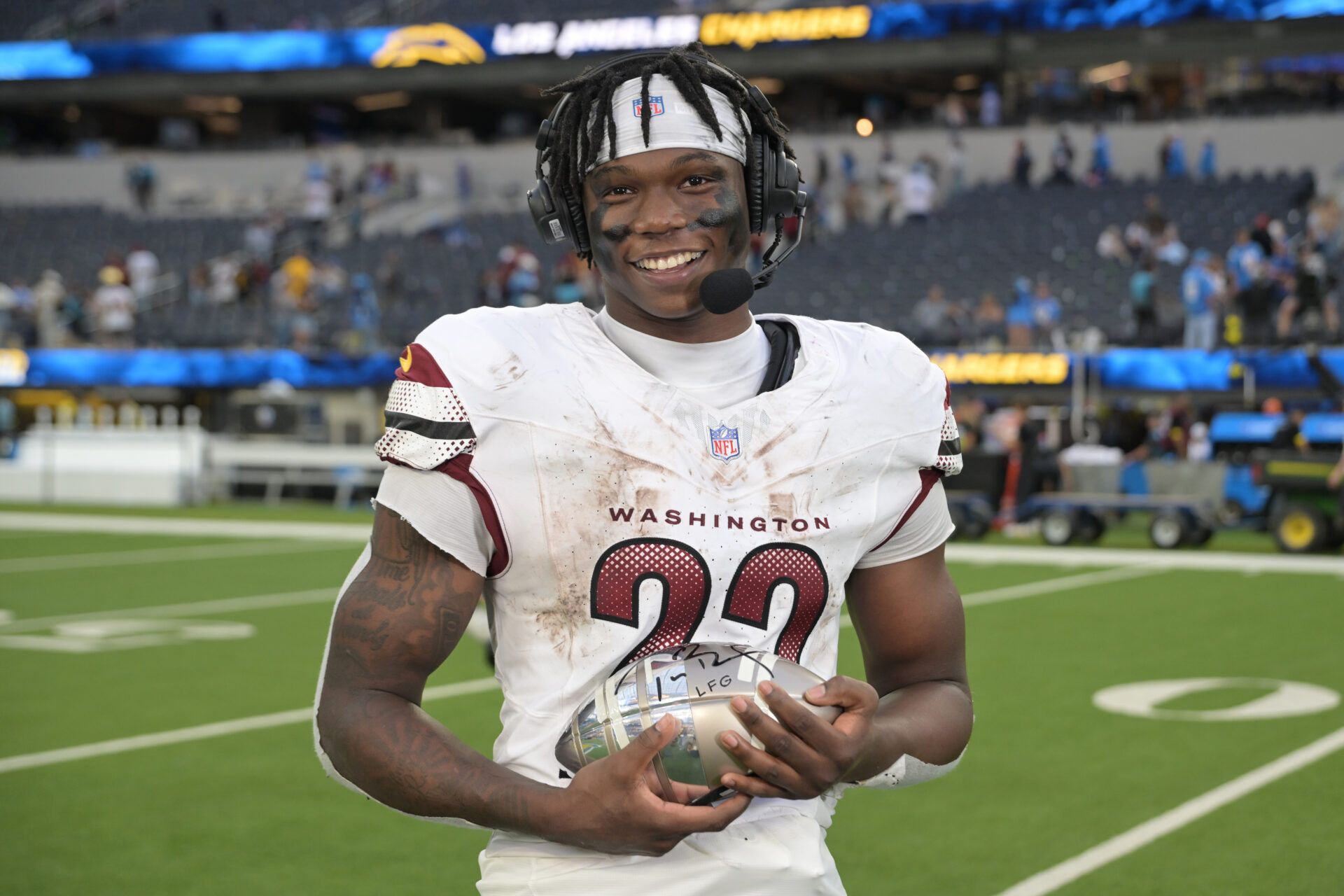 Washington Commanders running back Jacory Croskey-Merritt (22) is interviewed after the game against the Los Angeles Chargers at SoFi Stadium.