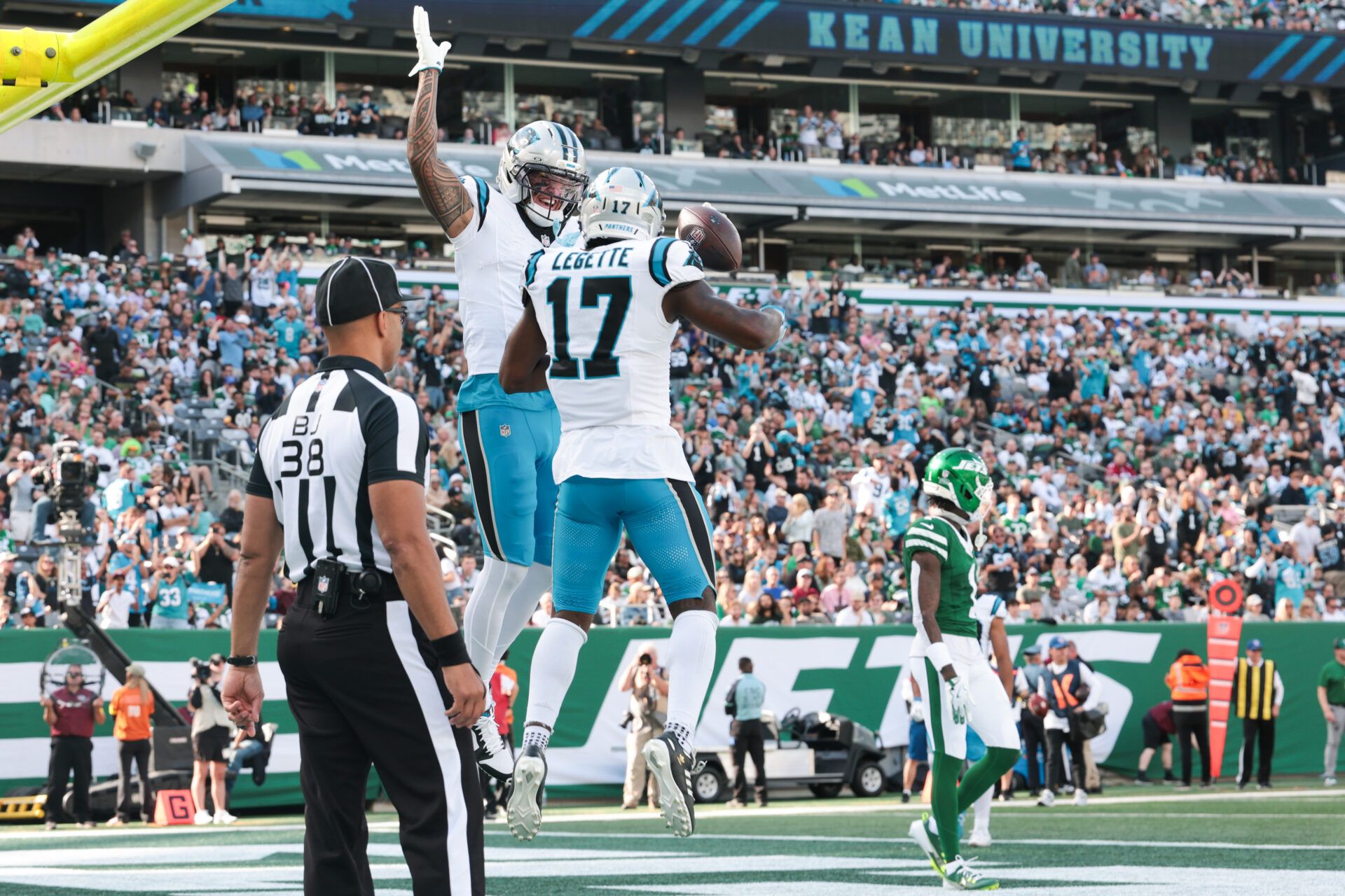Carolina Panthers wide receiver Tetairoa McMillan (4) and wide receiver Xavier Legette (17) celebrate a touchdown in the second quarter against the New York Jets at MetLife Stadium.