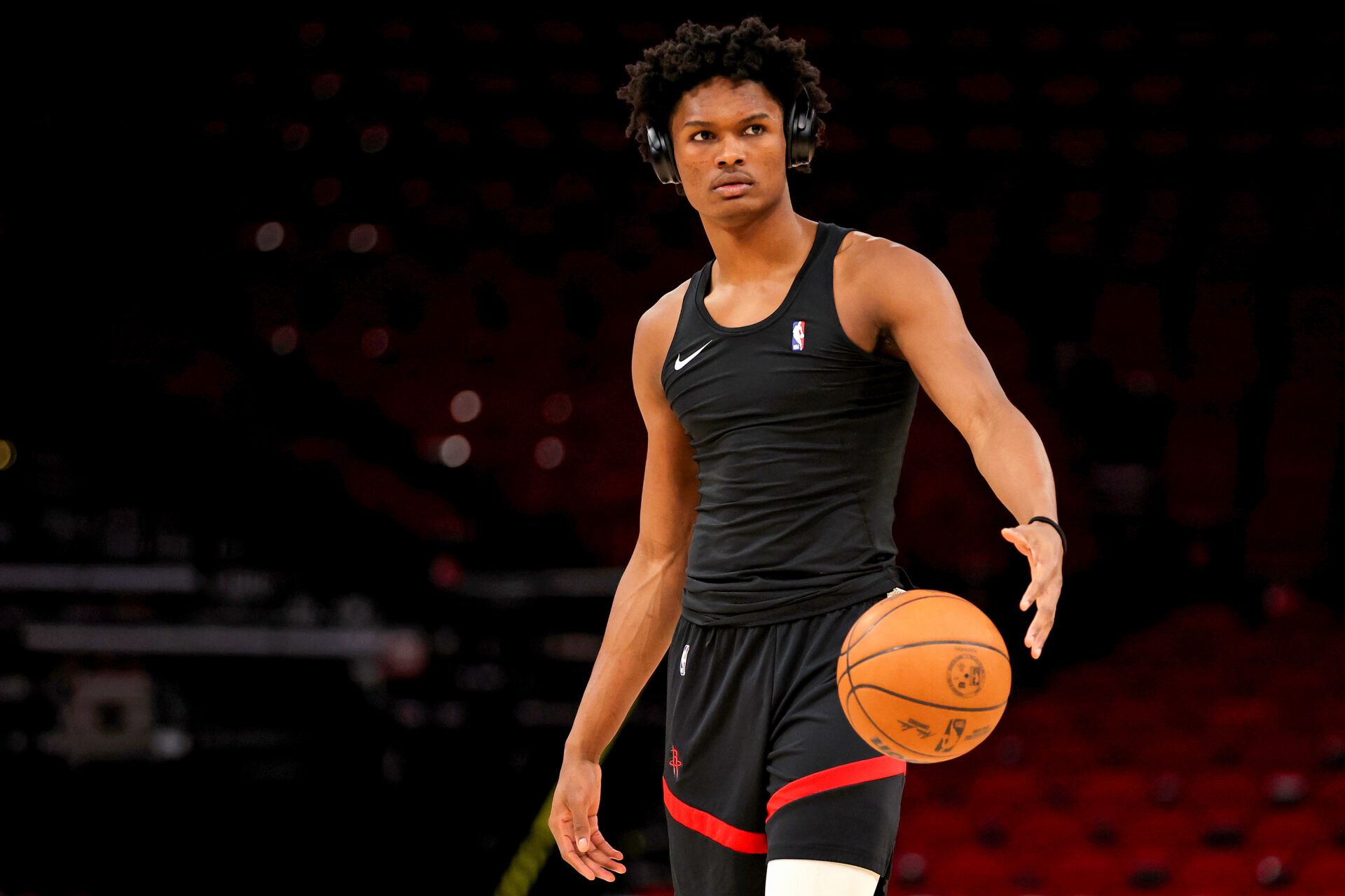Houston Rockets guard Amen Thompson (1) warms up prior to the game against the Sacramento Kings at Toyota Center.