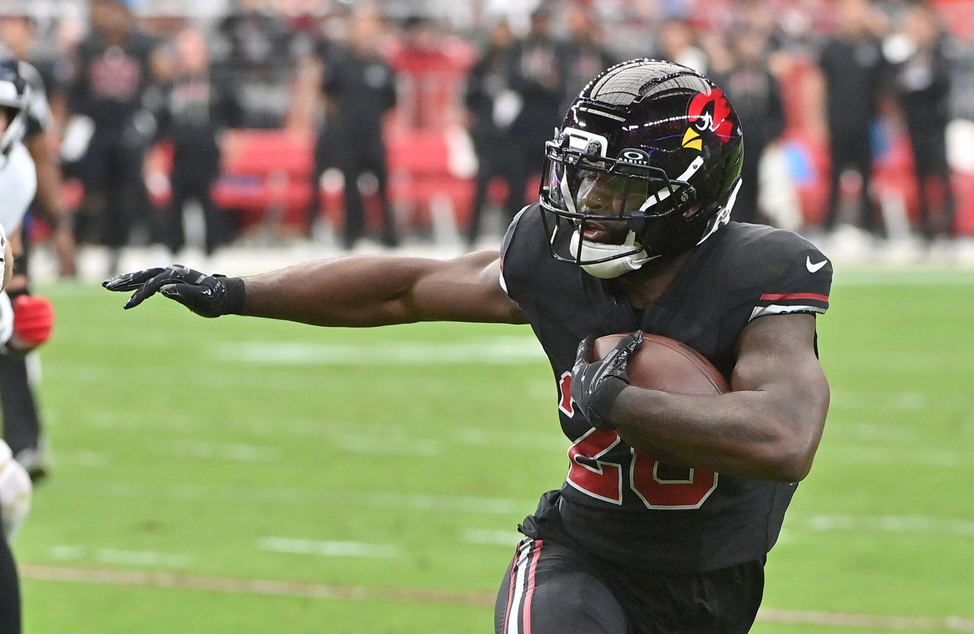 Arizona Cardinals running back Bam Knight (20) runs against the Tennessee Titans during the second quarter at State Farm Stadium.