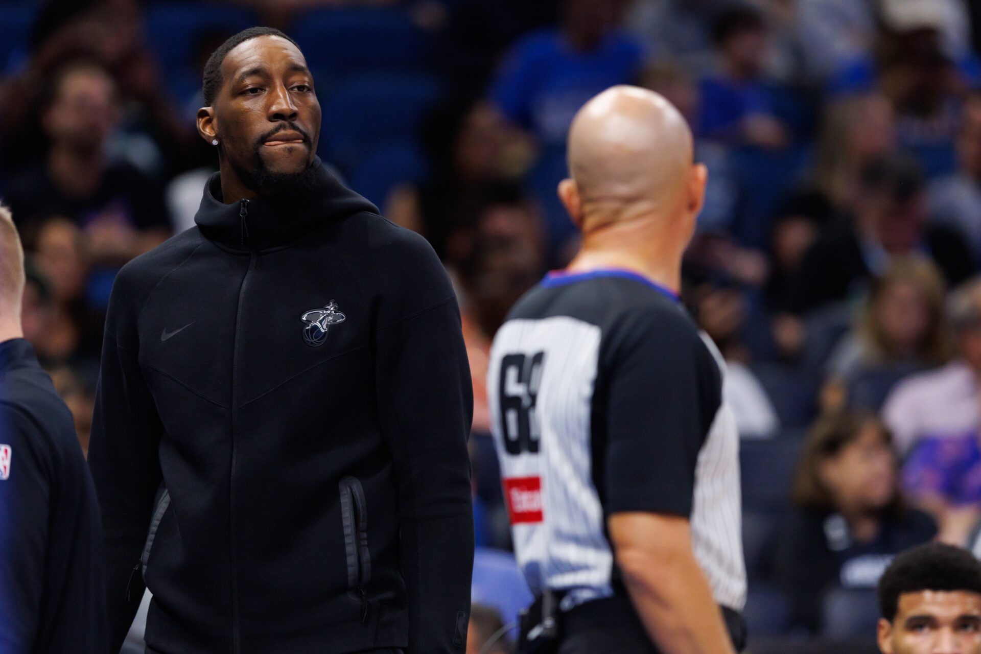 Miami Heat center Bam Adebayo (13) talks with NBA referee Jacyn Goble during a timeout against the Orlando Magic during the first half at Kia Center.