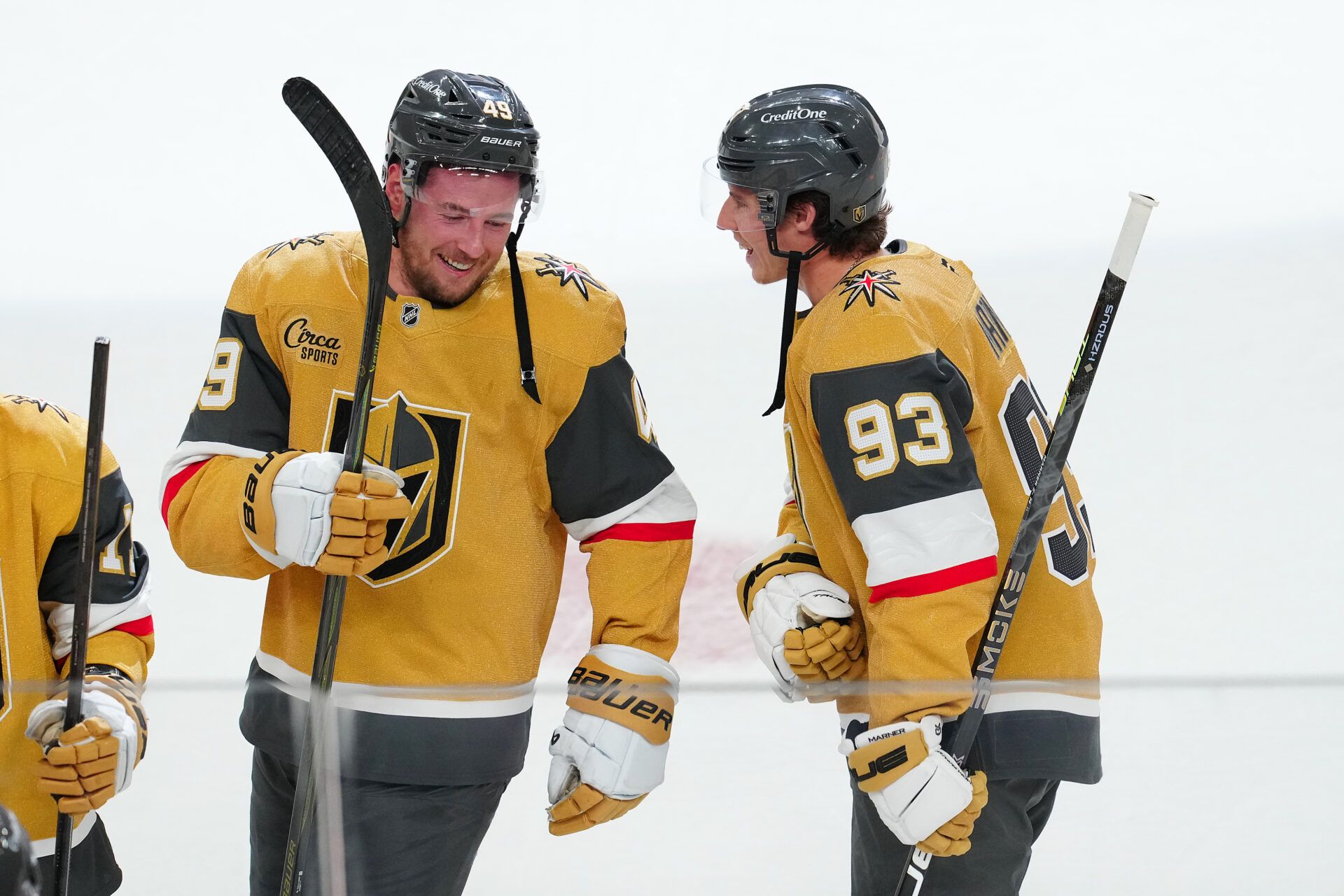 Vegas Golden Knights left wing Ivan Barbashev (49) talks with right wing Mitch Marner (93) after the Golden Knights defeated the Calgary Flames 6-1 at T-Mobile Arena.