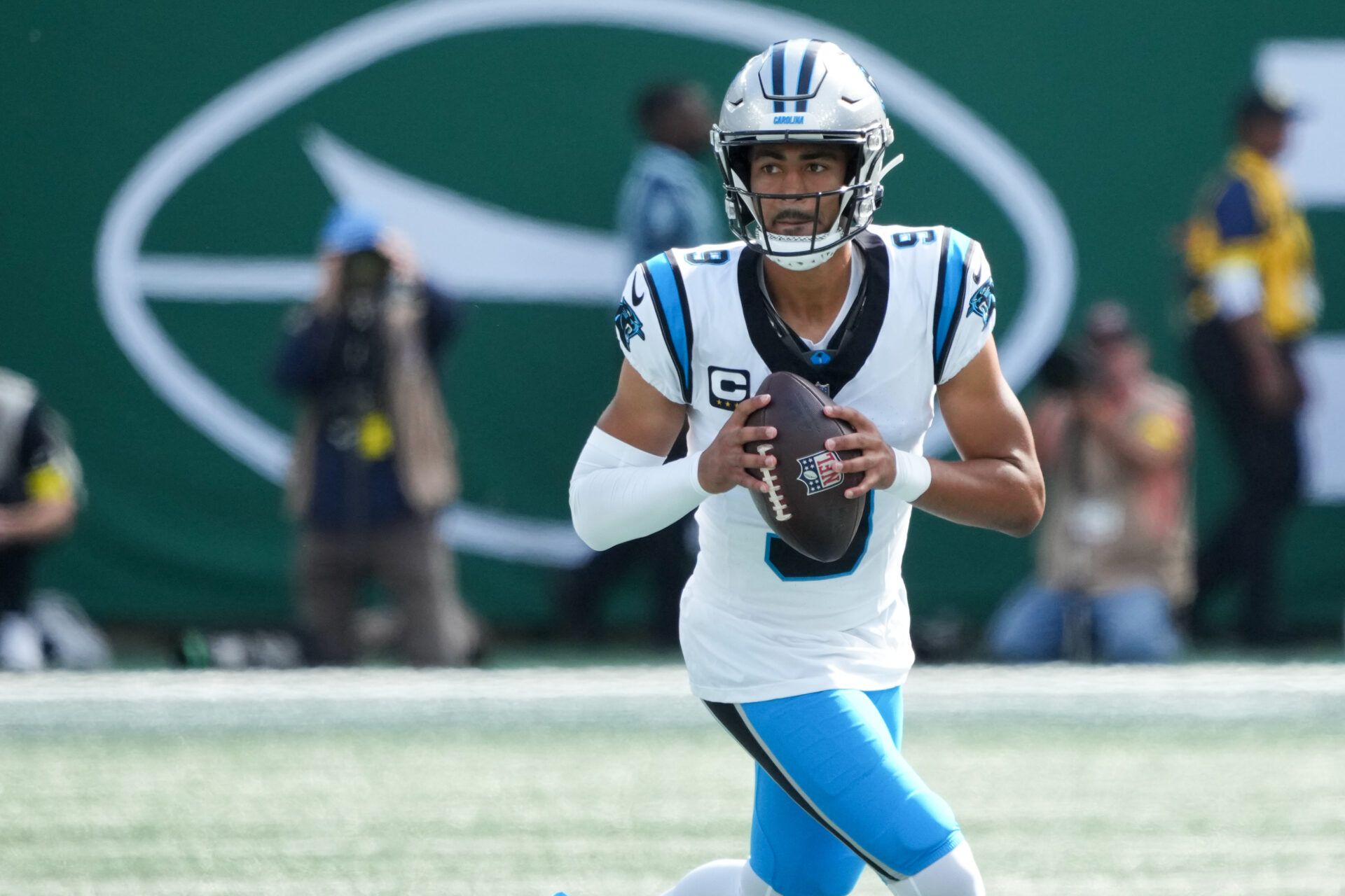 Carolina Panthers quarterback Bryce Young (9) runs out of the pocket in the first quarter against the New York Jets at MetLife Stadium.