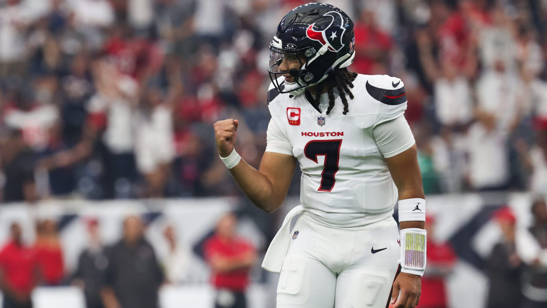 Houston Texans quarterback C.J. Stroud (7) celebrates after throwing a touchdown pass during the first quarter against the Tampa Bay Buccaneers at NRG Stadium.