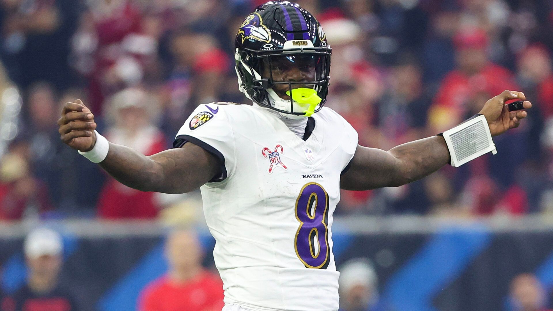 Baltimore Ravens quarterback Lamar Jackson (8) reacts under center against the Houston Texans in the first quarter at NRG Stadium.