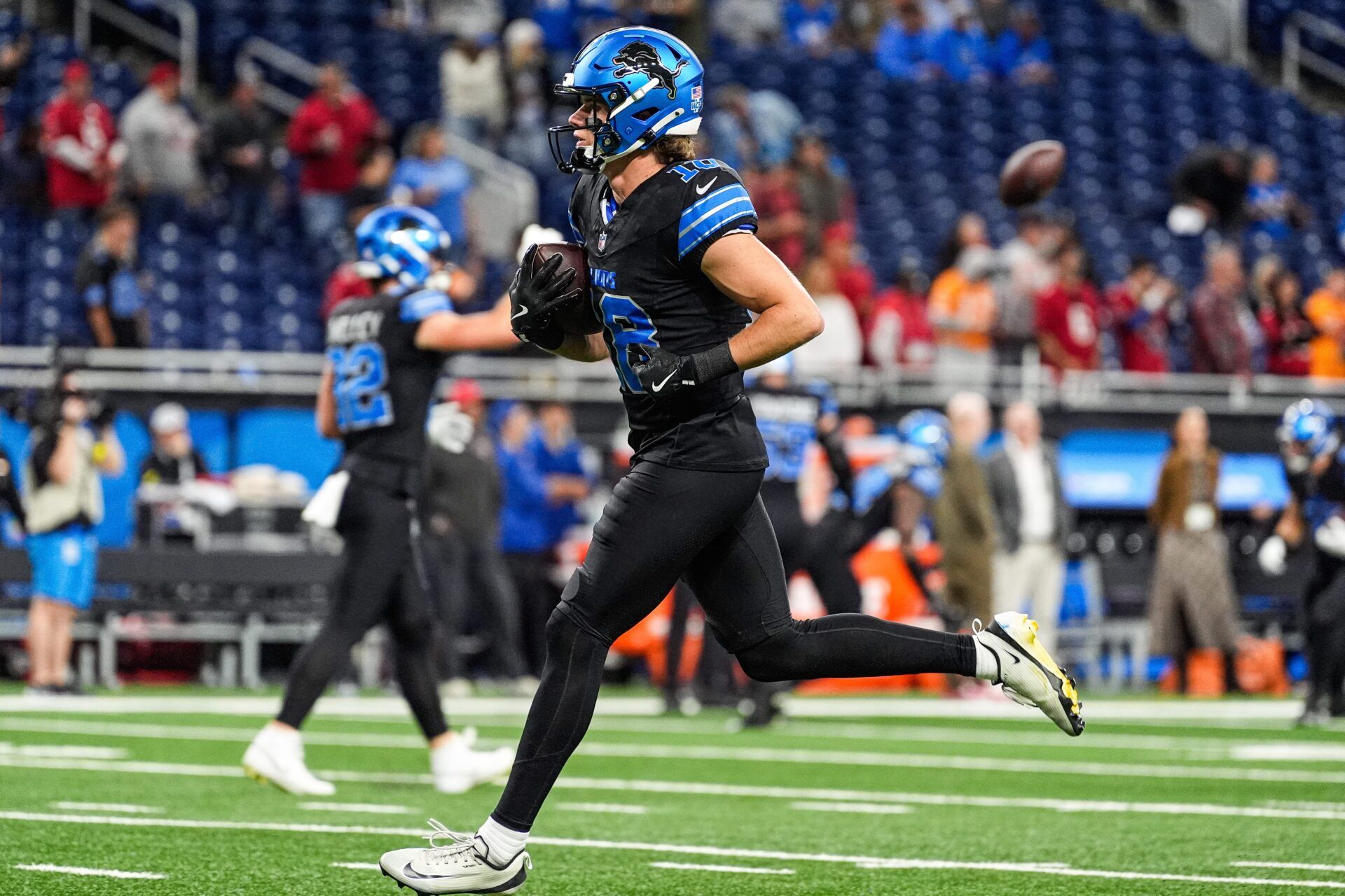 Detroit Lions wide receiver Isaac Teslaa (18) warms up ahead of the Tampa Bay Buccaneers game at Ford Field in Detroit on Monday, Oct. 20, 2025.