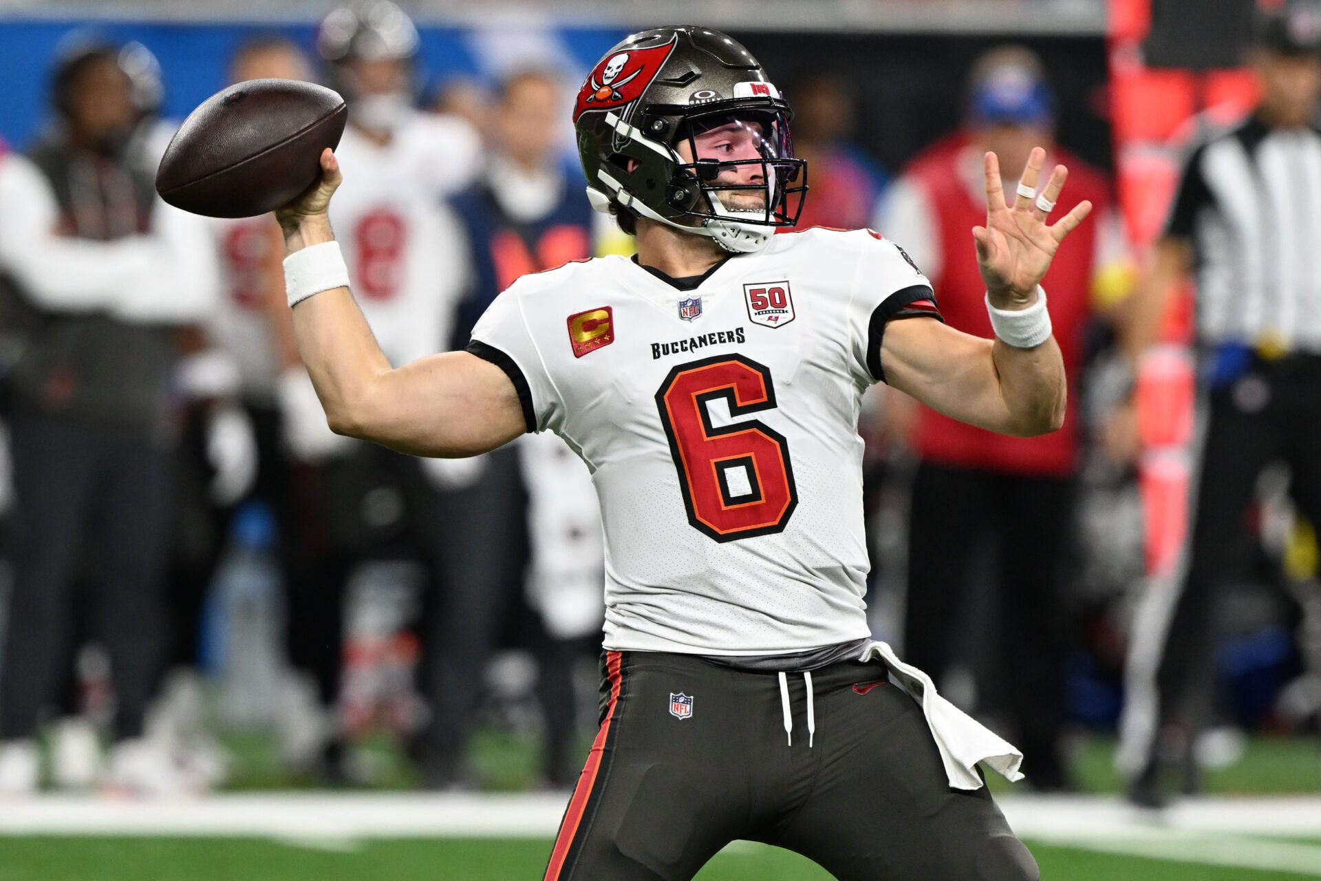 Tampa Bay Buccaneers quarterback Baker Mayfield (6) drops back to pass against the Detroit Lions during the first half at Ford Field.