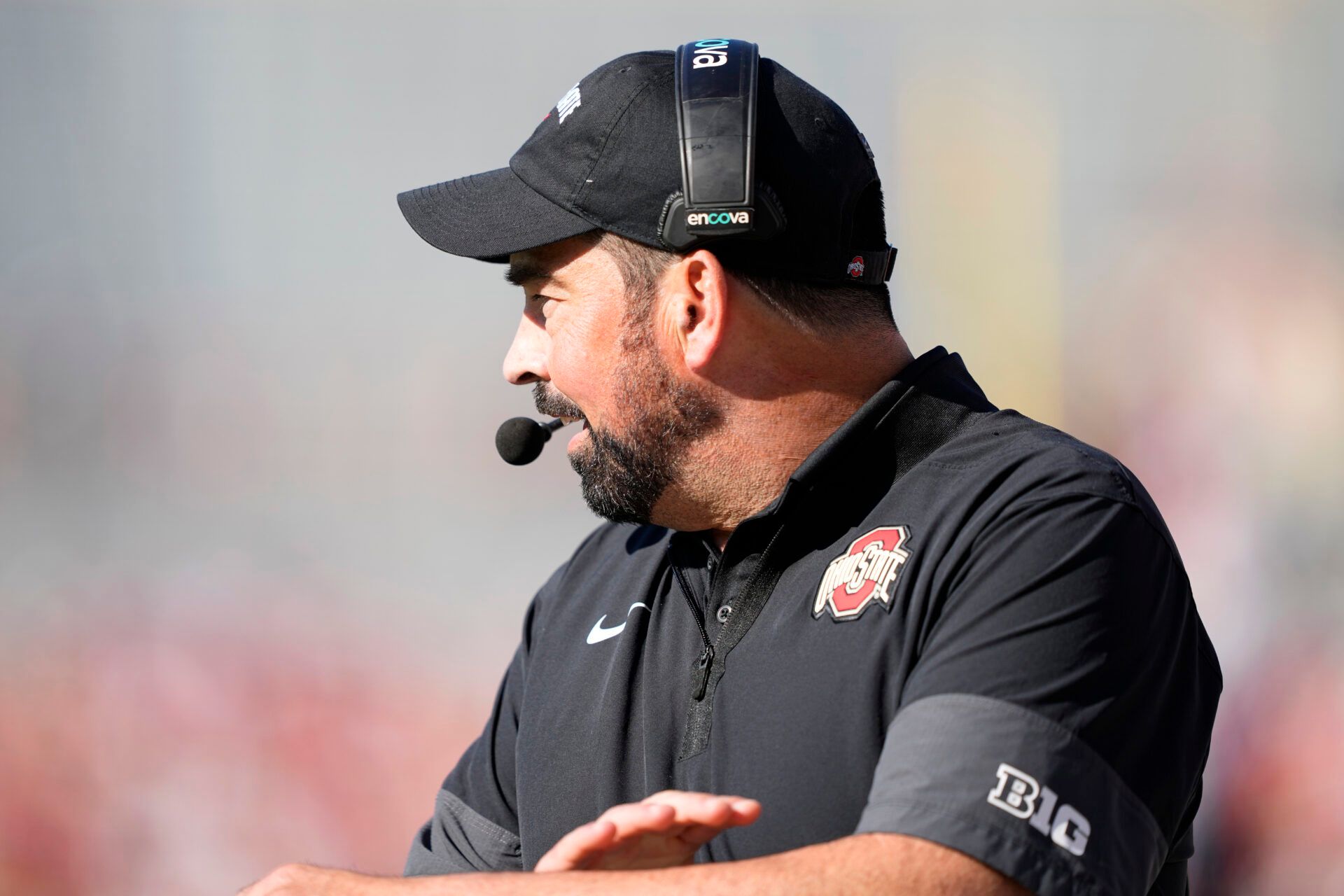 Ohio State Buckeyes head coach Ryan Day looks on in the first quarter against the Wisconsin Badgers at Camp Randall Stadium.