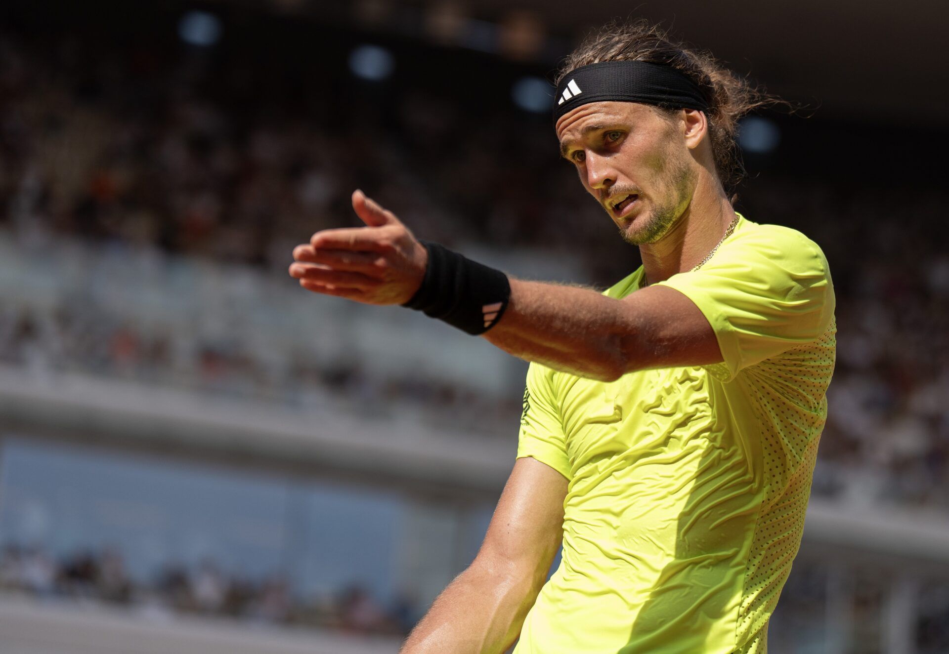 Alexander Zverev of Germany reacts to a point during his match against Flavio Cobolli of Italy on day seven at Roland Garros Stadium.