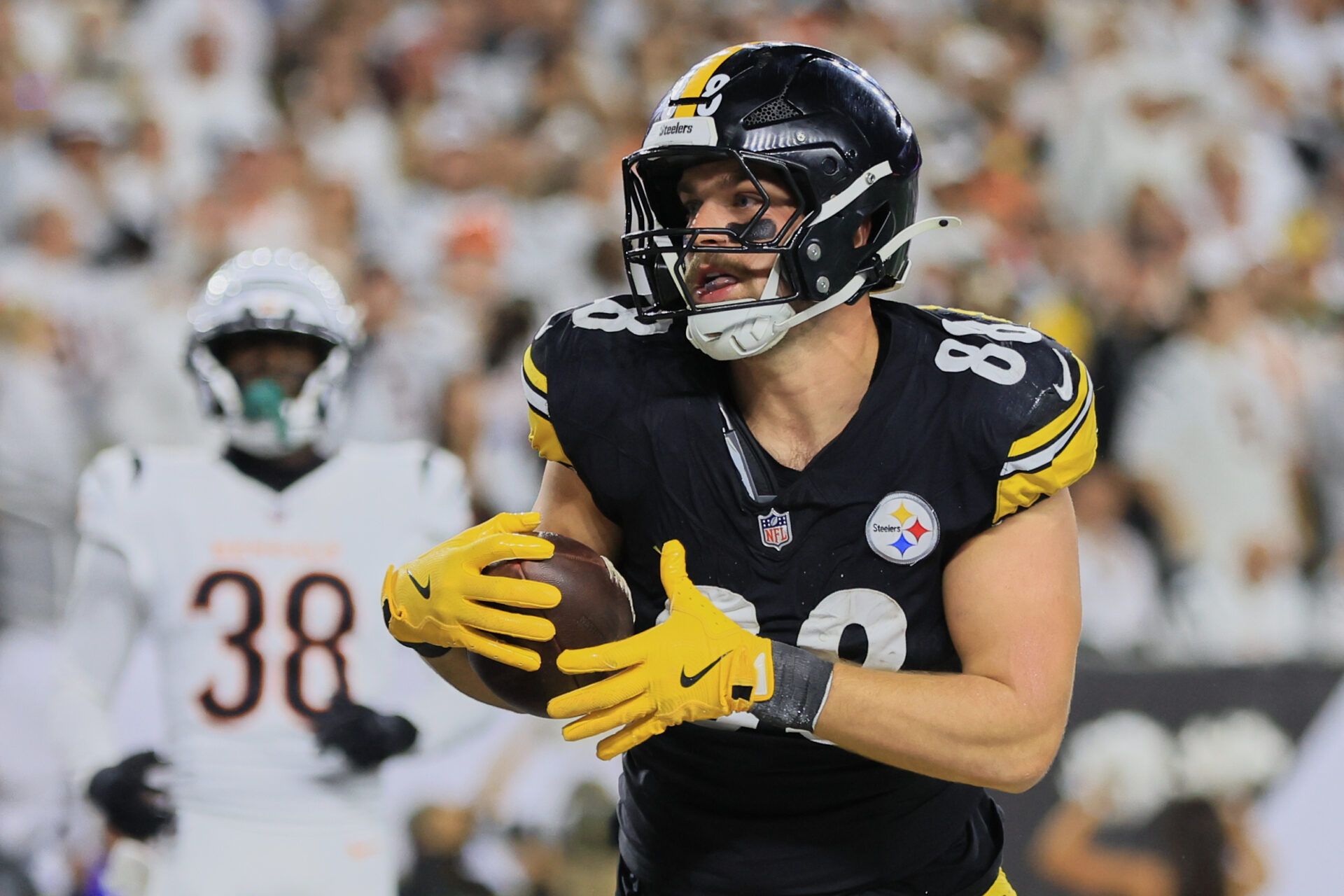 Pittsburgh Steelers tight end Pat Freiermuth (88) reacts after catching a touchdown pass thrown by quarterback Aaron Rodgers (8) (not pictured) against the Cincinnati Bengals during the third quarter at Paycor Stadium.