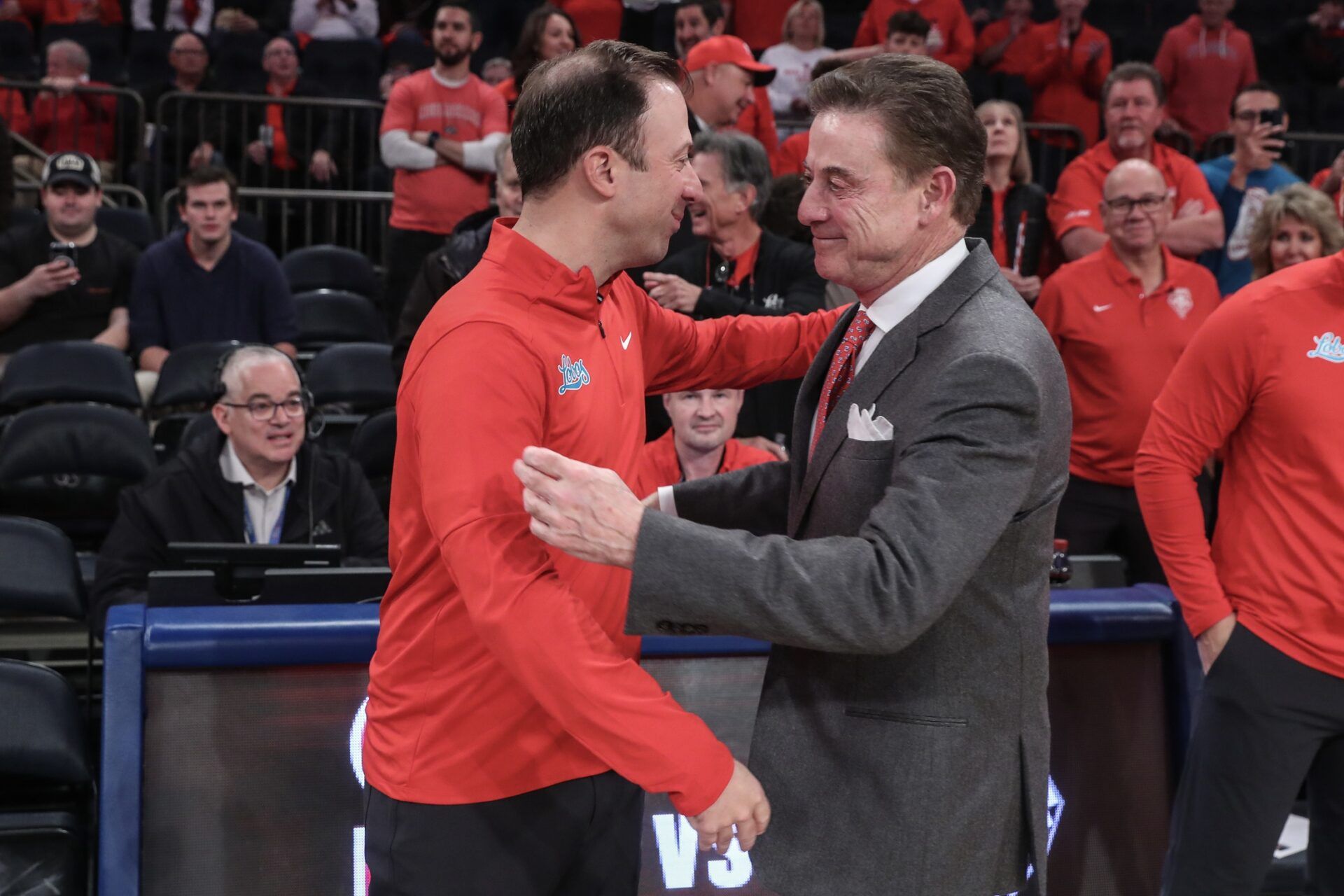 New Mexico Lobos head coach Richard Pitino and St. John's Red Storm head coach Rick Pitino greet each other prior to the start of the game at Madison Square Garden.