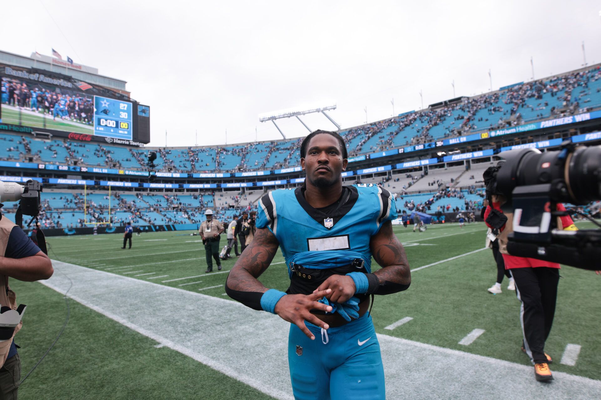 Carolina Panthers running back Rico Dowdle (5) looks on after the game against the Dallas Cowboys  at Bank of America Stadium.