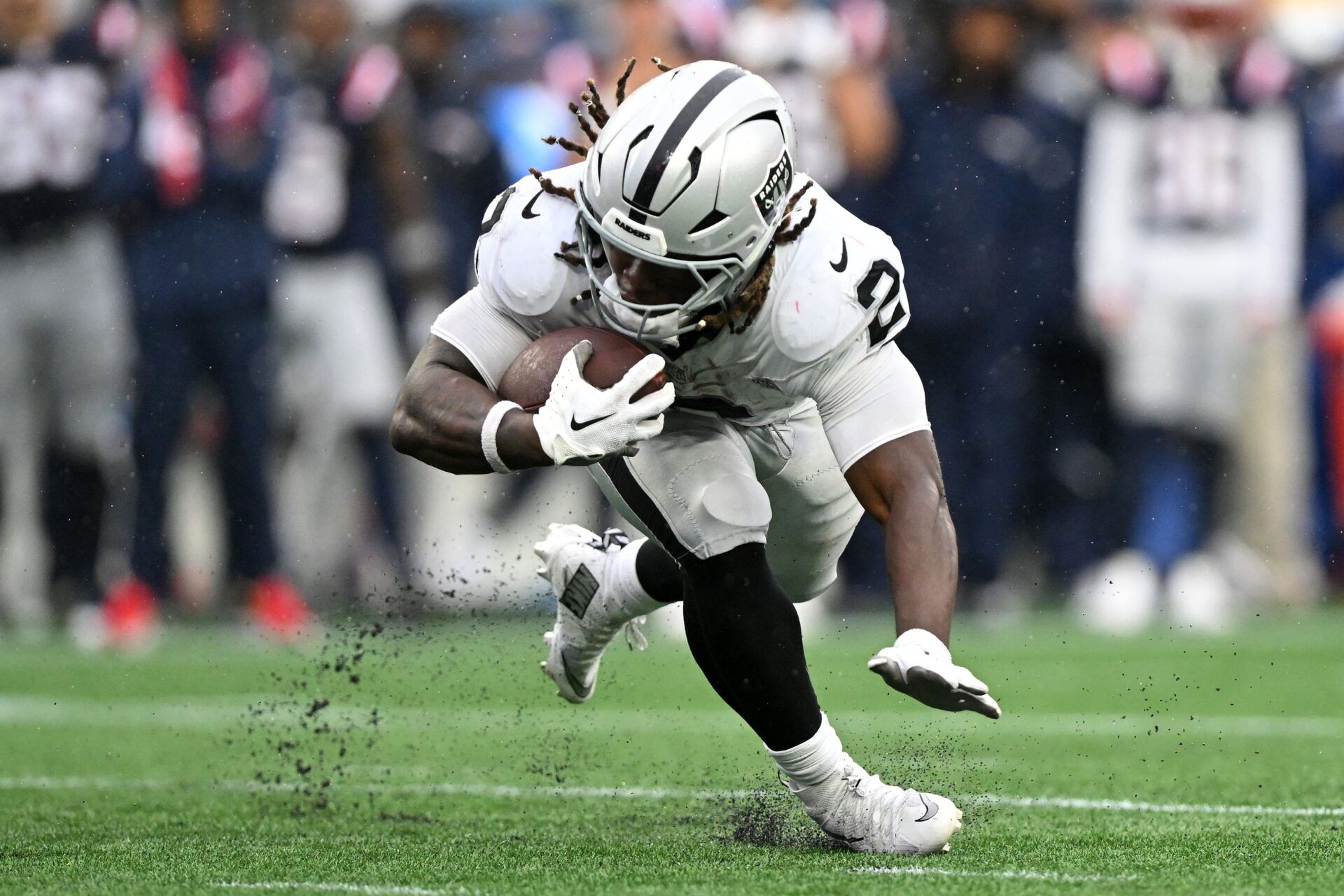 Las Vegas Raiders running back Ashton Jeanty (2) rushes the ball against the New England Patriots during the second half at Gillette Stadium.