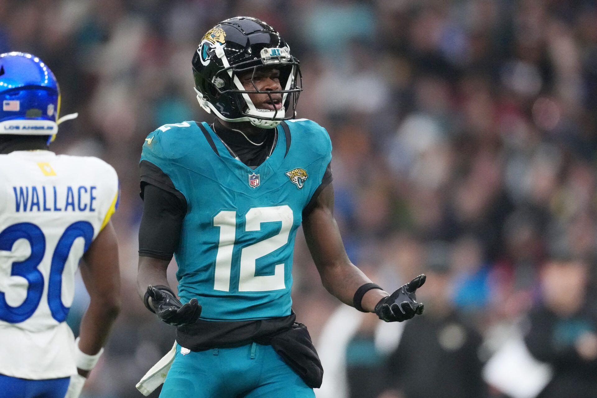Jacksonville Jaguars wide receiver Travis Hunter (12) reacts after a play against the Los Angeles Rams during the second half of an NFL International Series game at Wembley Stadium.