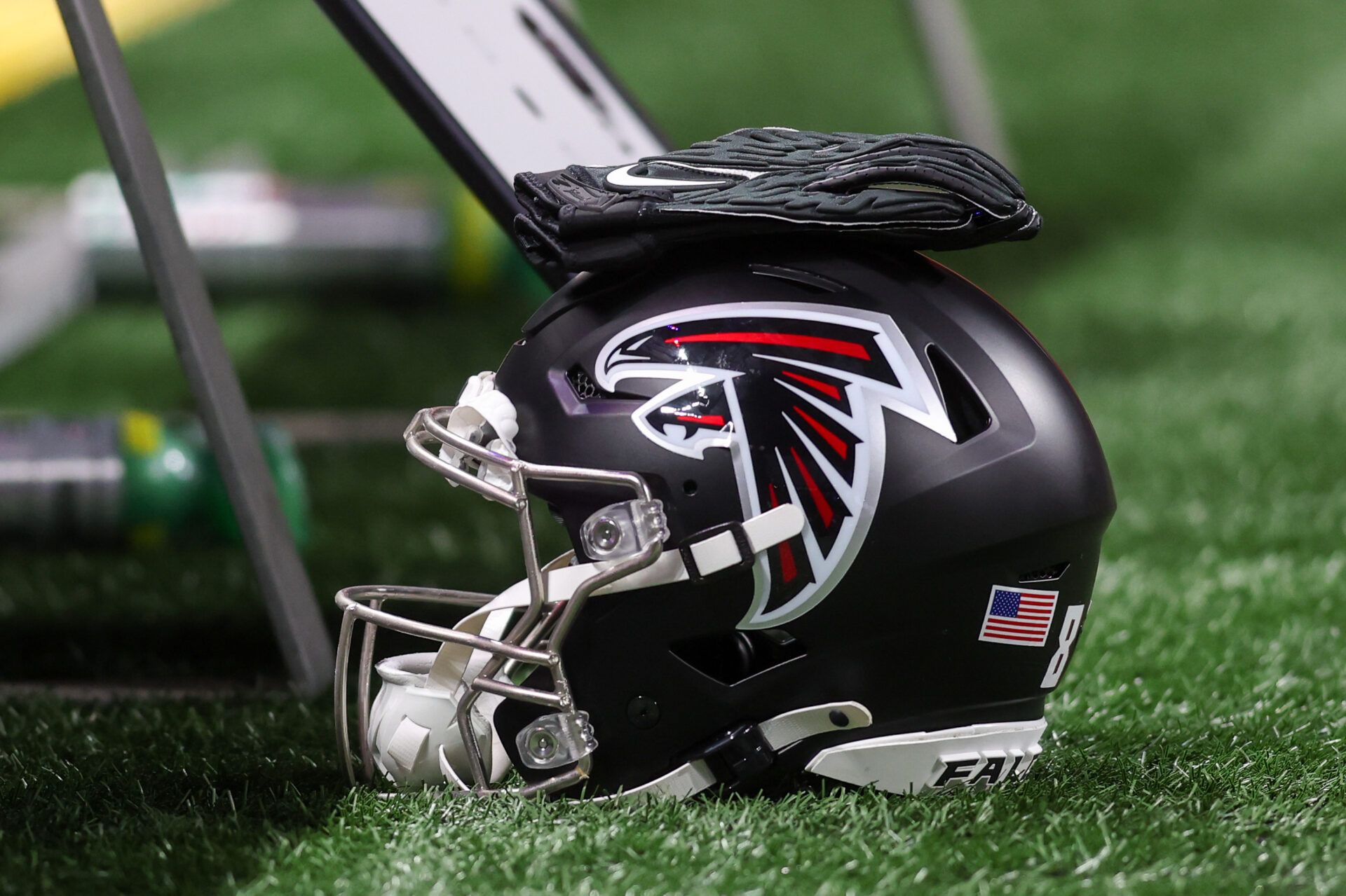 Atlanta Falcons helmet on the sideline against the Tennessee Titans in the first quarter at Mercedes-Benz Stadium.