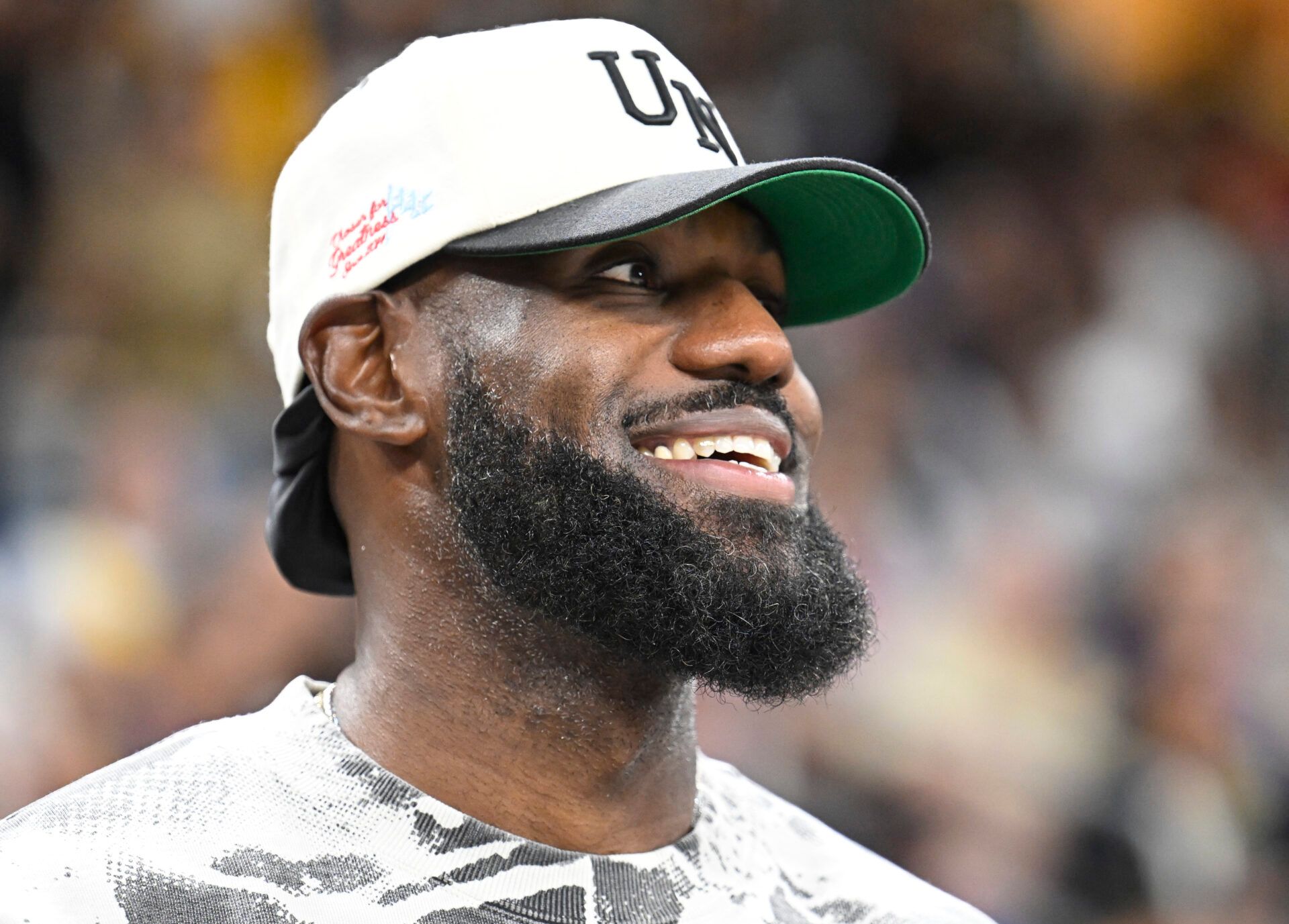 Los Angeles Lakers player LeBron James looks on during the first half of a game between the Phoenix Suns and the Los Angeles Lakers at Acrisure Arena.