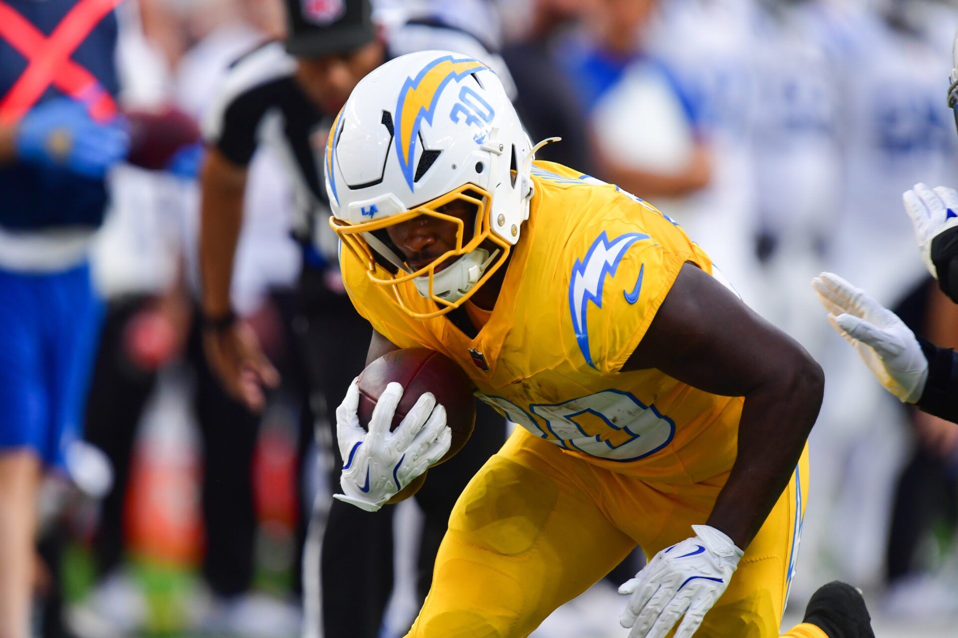 Los Angeles Chargers running back Kimani Vidal (30) runs the ball in the second half against the Indianapolis Colts at SoFi Stadium.