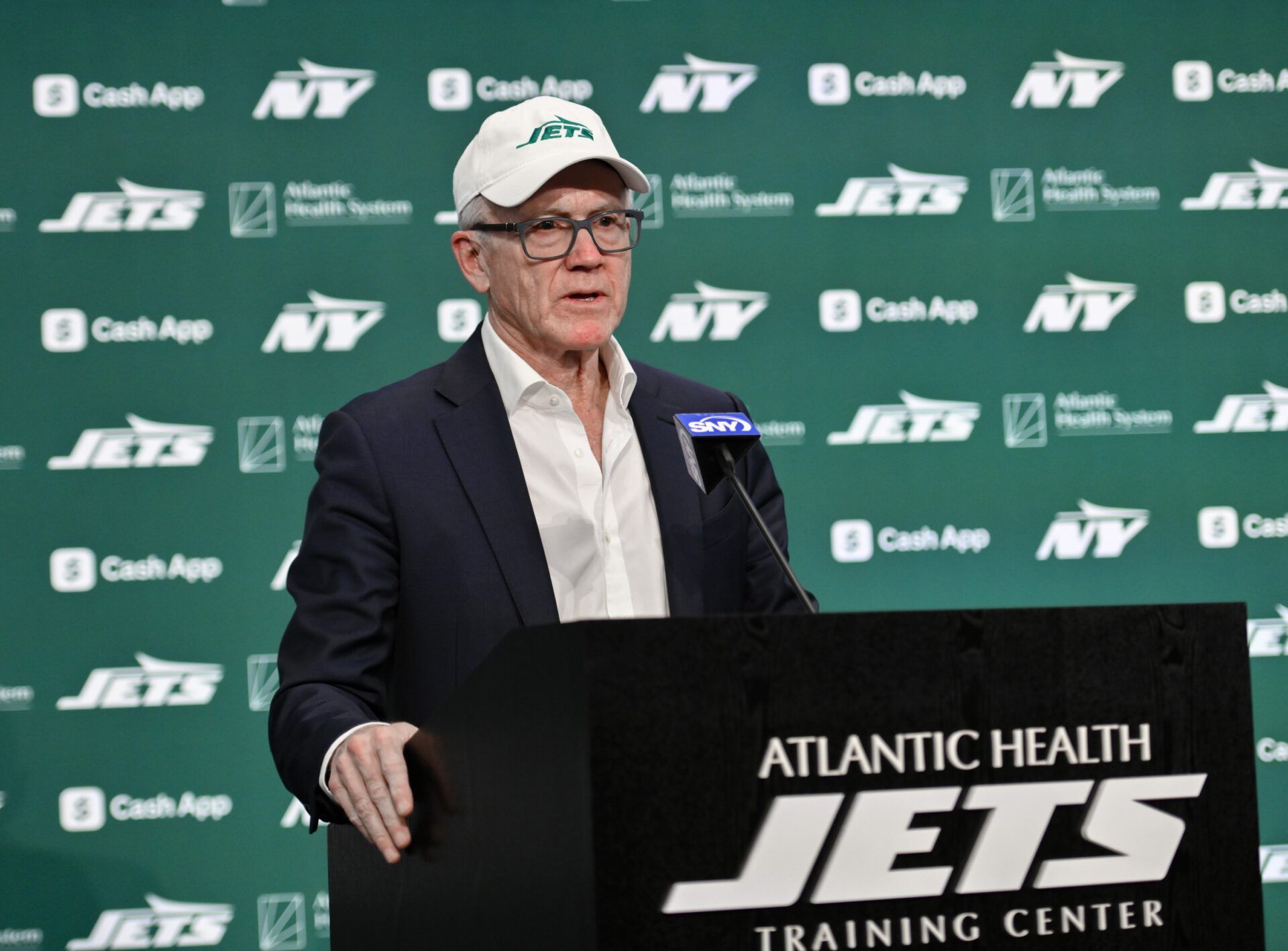 New York Jets owner Woody Johnson speaks during an introductory press conference at Atlantic Health Jets Training Center.