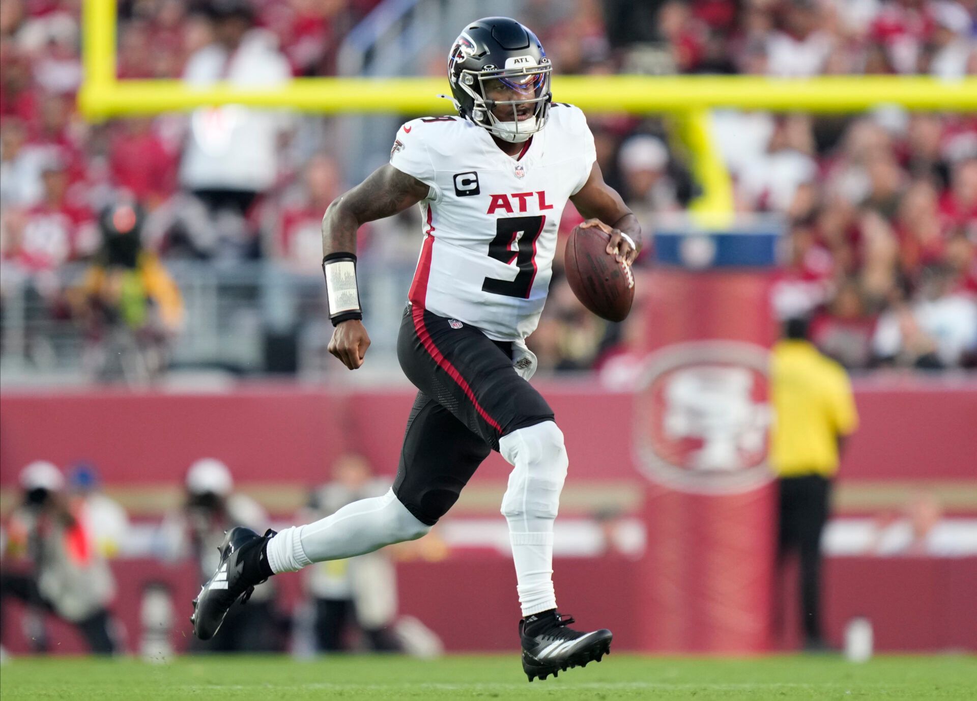 Atlanta Falcons quarterback Michael Penix Jr. (9) runs with the ball during the second quarter against the San Francisco 49ers at Levi's Stadium.